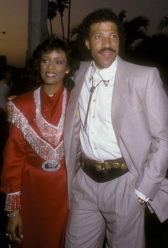 Lionel Richie and Brenda Harvey attend Share Boomtown Party on May 1, 1985 | Photo: Getty Images