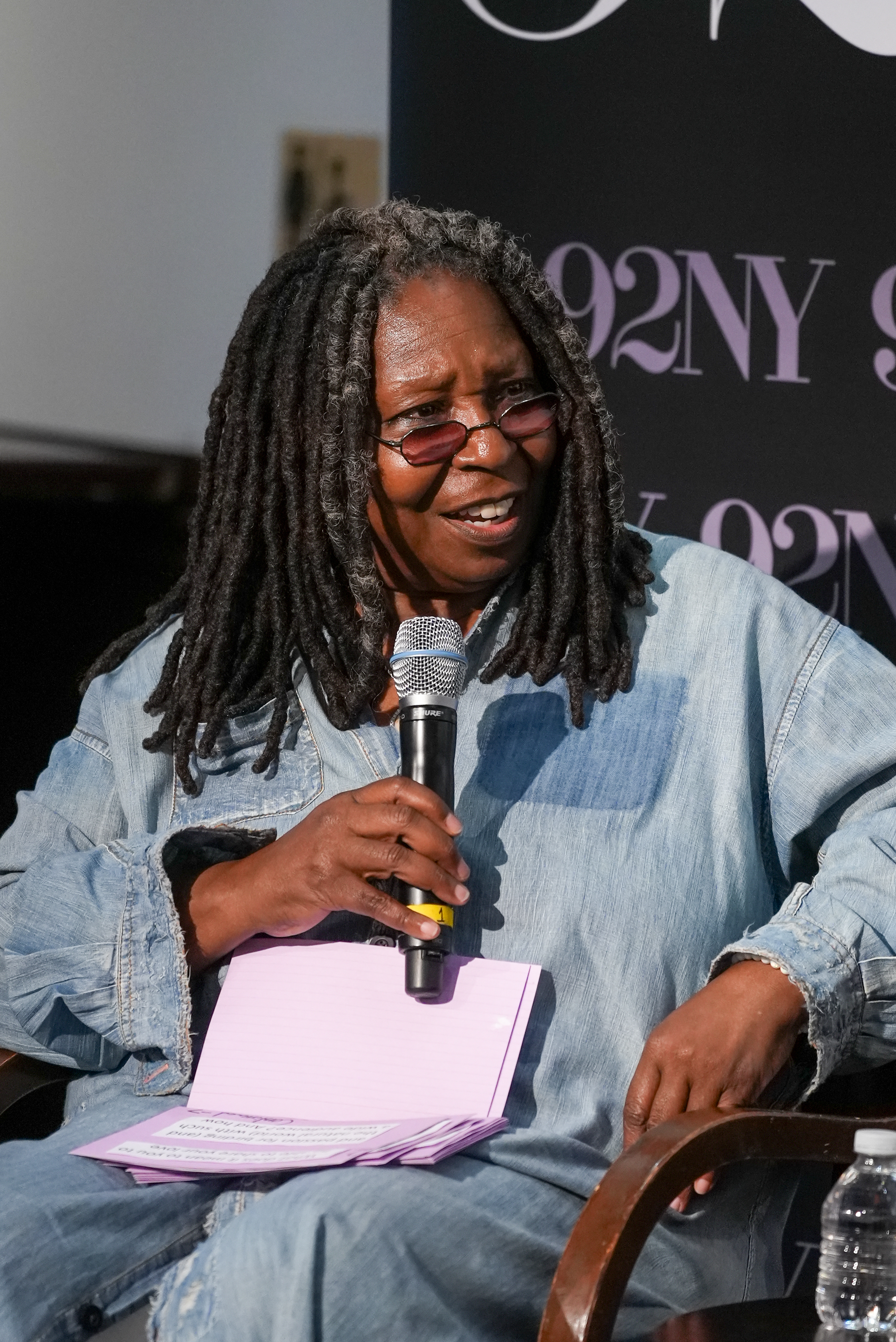 Whoopi Goldberg having a discussion with Christian Cooper in New York City, 2023 | Source: Getty Images