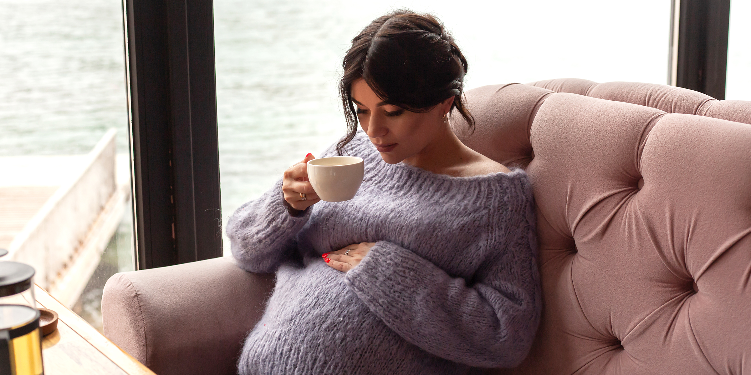 A pregnant woman in a restaurant | Source: Shutterstock