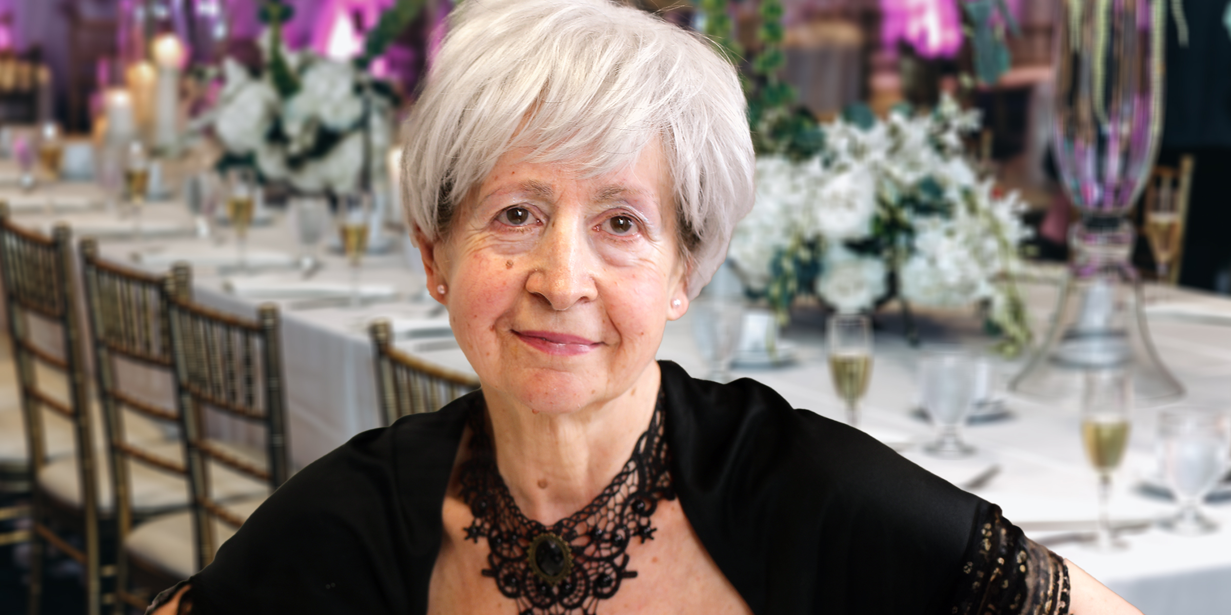 An older woman in a black dress | Source: Shutterstock