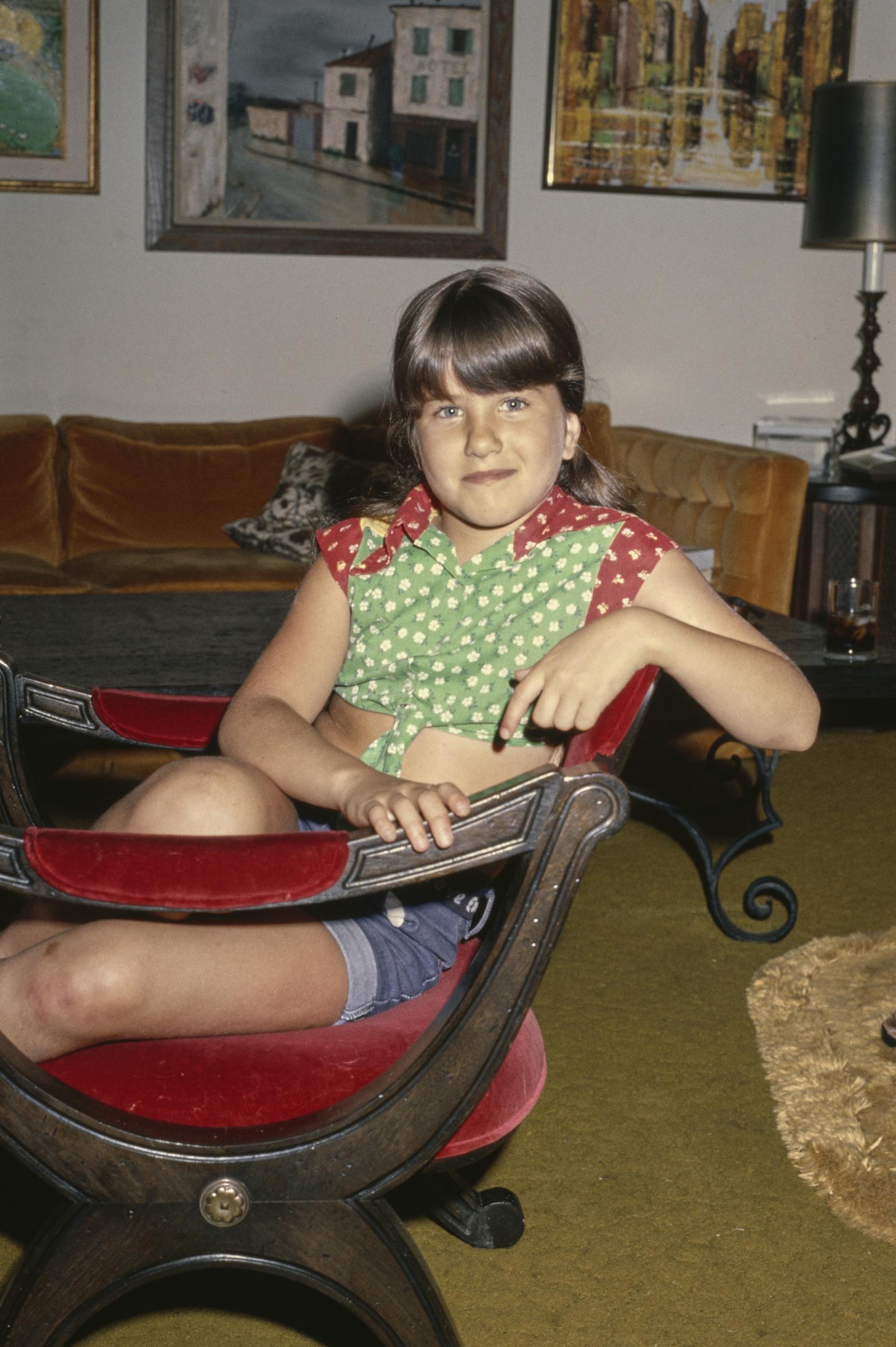 Jennifer Aniston is pictured at home in 1975. Long before becoming a television star, she grew up in a family with ties to the entertainment industry. | Source: Getty Images