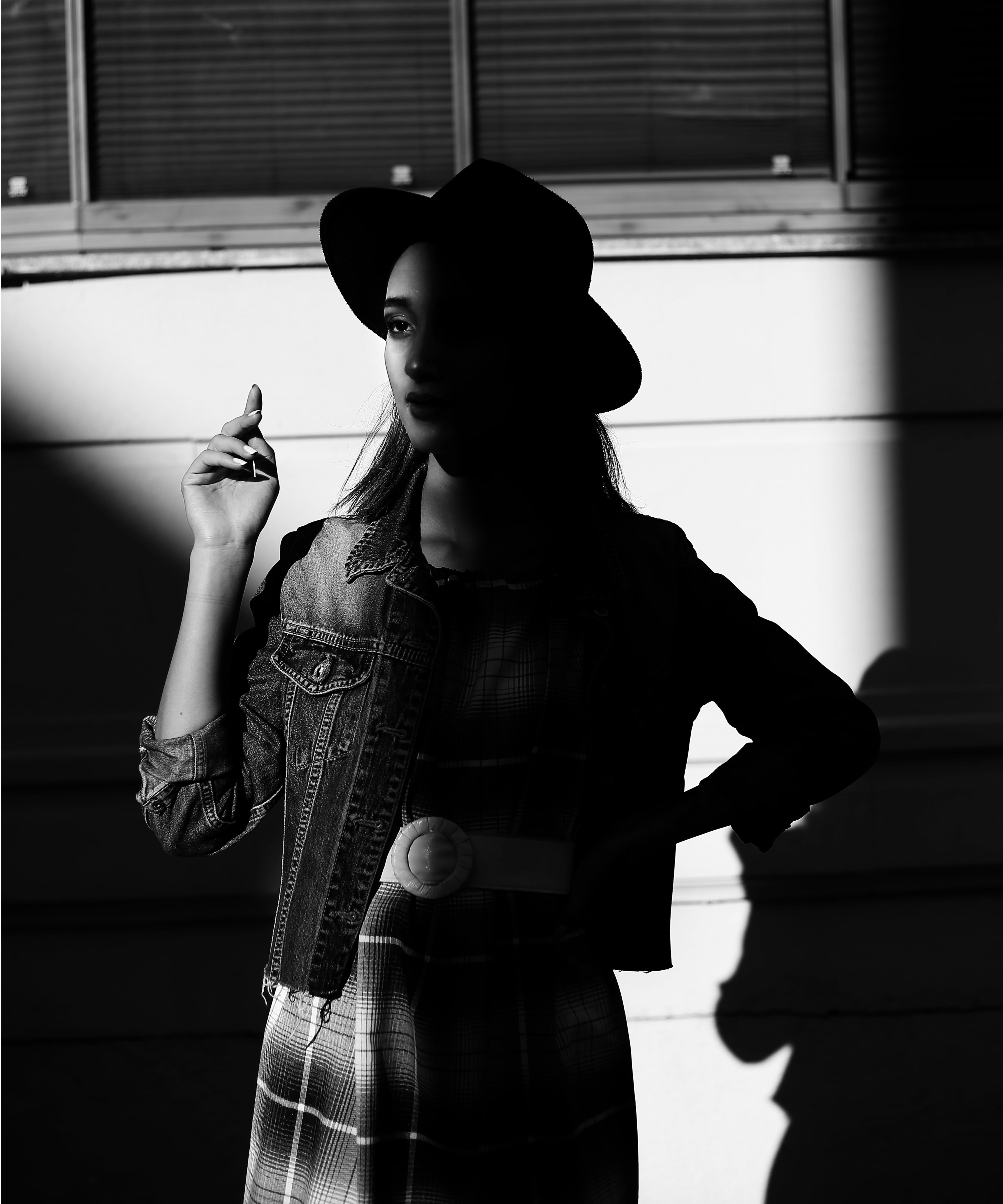Woman standing in dark | Source: Pexels