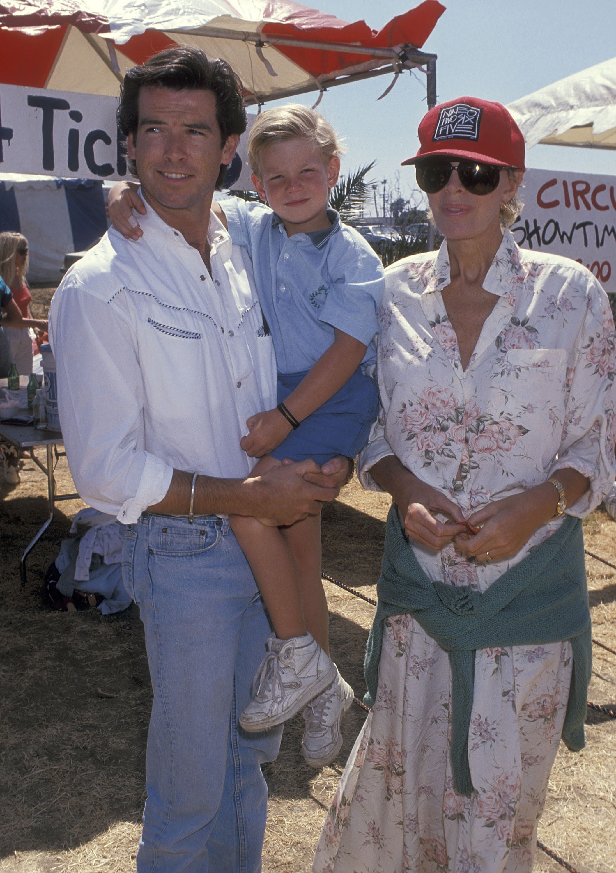 Pierce Brosnan, Sean Brosnan, and Cassandra Harris at the Eighth Annual Malibu Kiwanis Chili Cook-off Carnival and Fair in Malibu, 1989. | Source: Getty Images