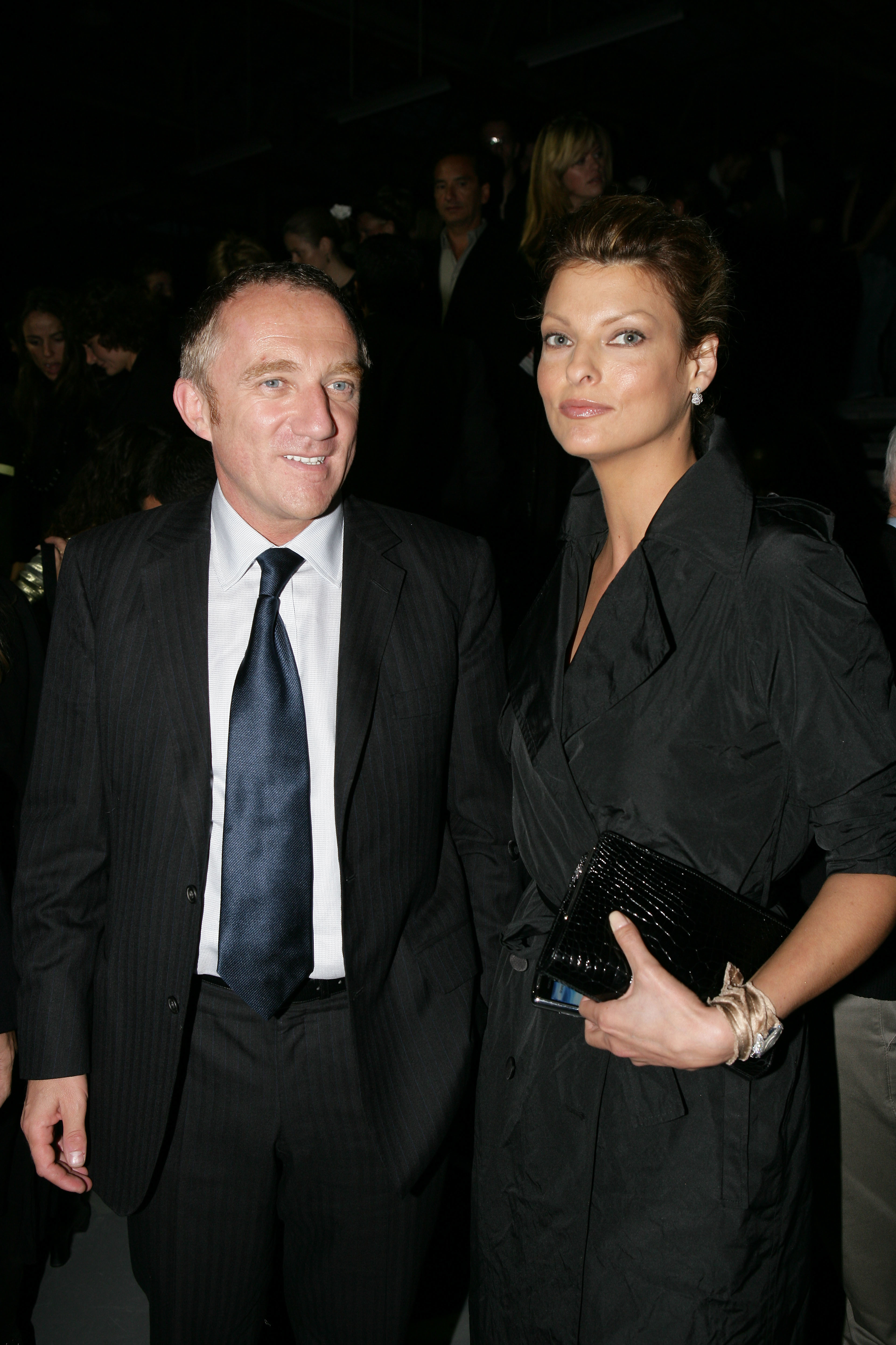 Francois-Henri Pinault and Linda Evangelista at the Alexander McQueen ready-to-wear spring-summer 2006 collection fashion show on October 8, 2005 | Source: Getty Images