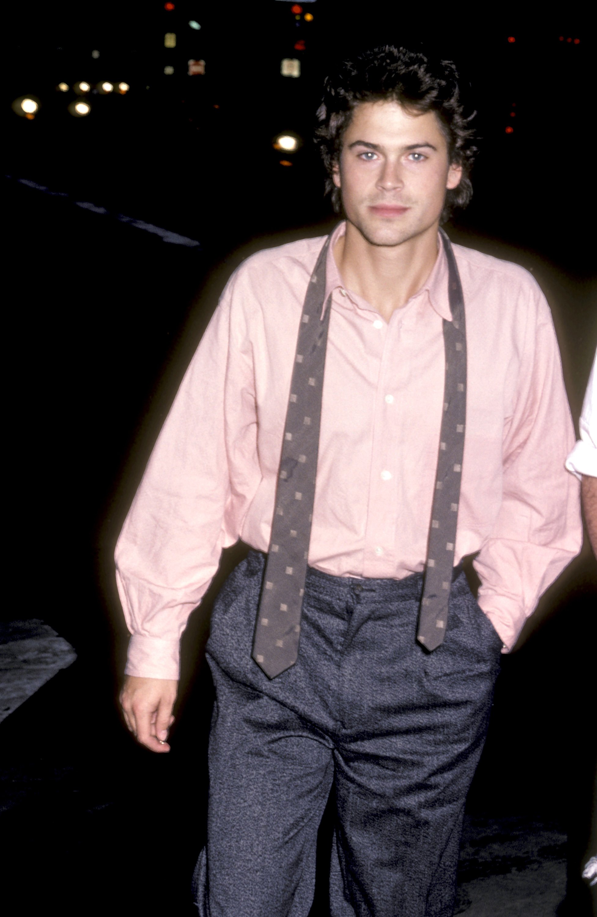 Hollywood hunk Rob Lowe on the set of 1986's romantic comedy film "About Last Night." / Source: Getty Images