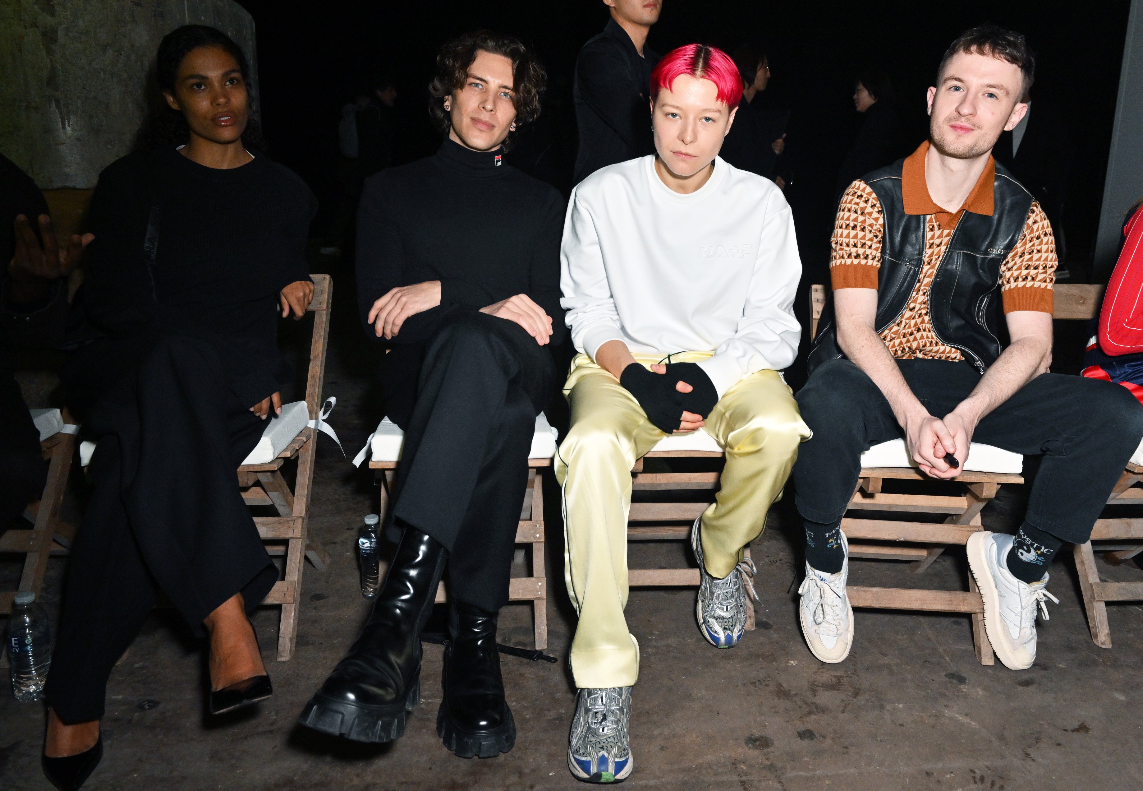 Tina Kunakey, Cody Fern, Emma D'Arcy and Thomas May Bailey attend the Haider Ackermann + FILA show on November 17, 2022, in Manchester, England.  | Source: Getty Images
