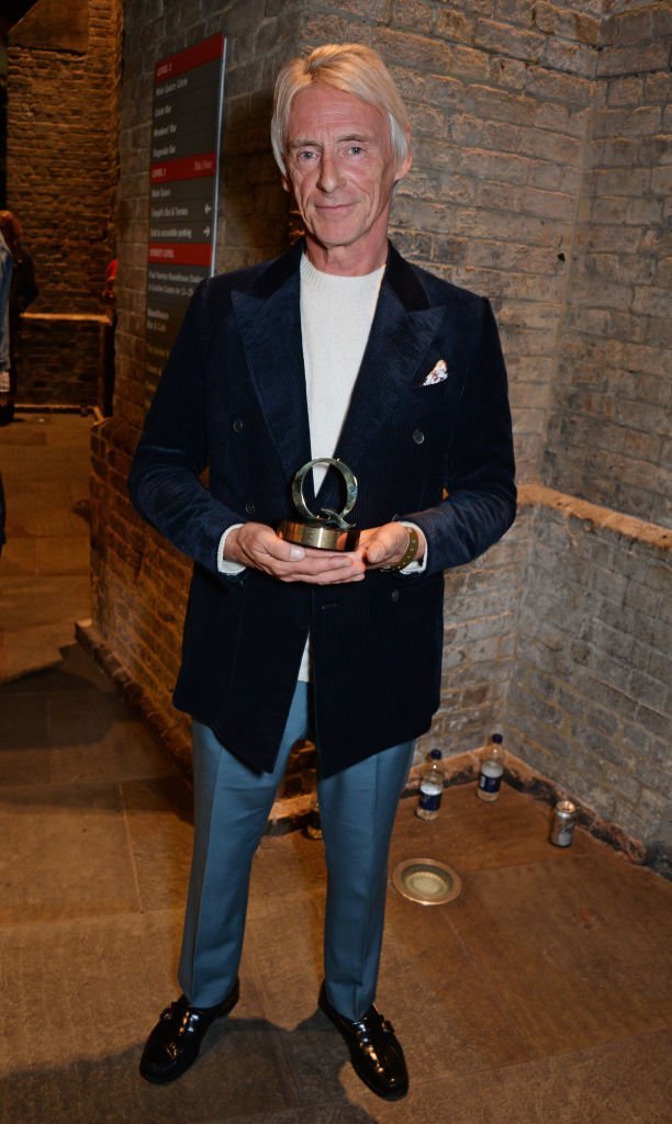 Paul Weller, winner of the Q Best Act In The World Today award, poses at the Q Awards 2018 | Getty Images
