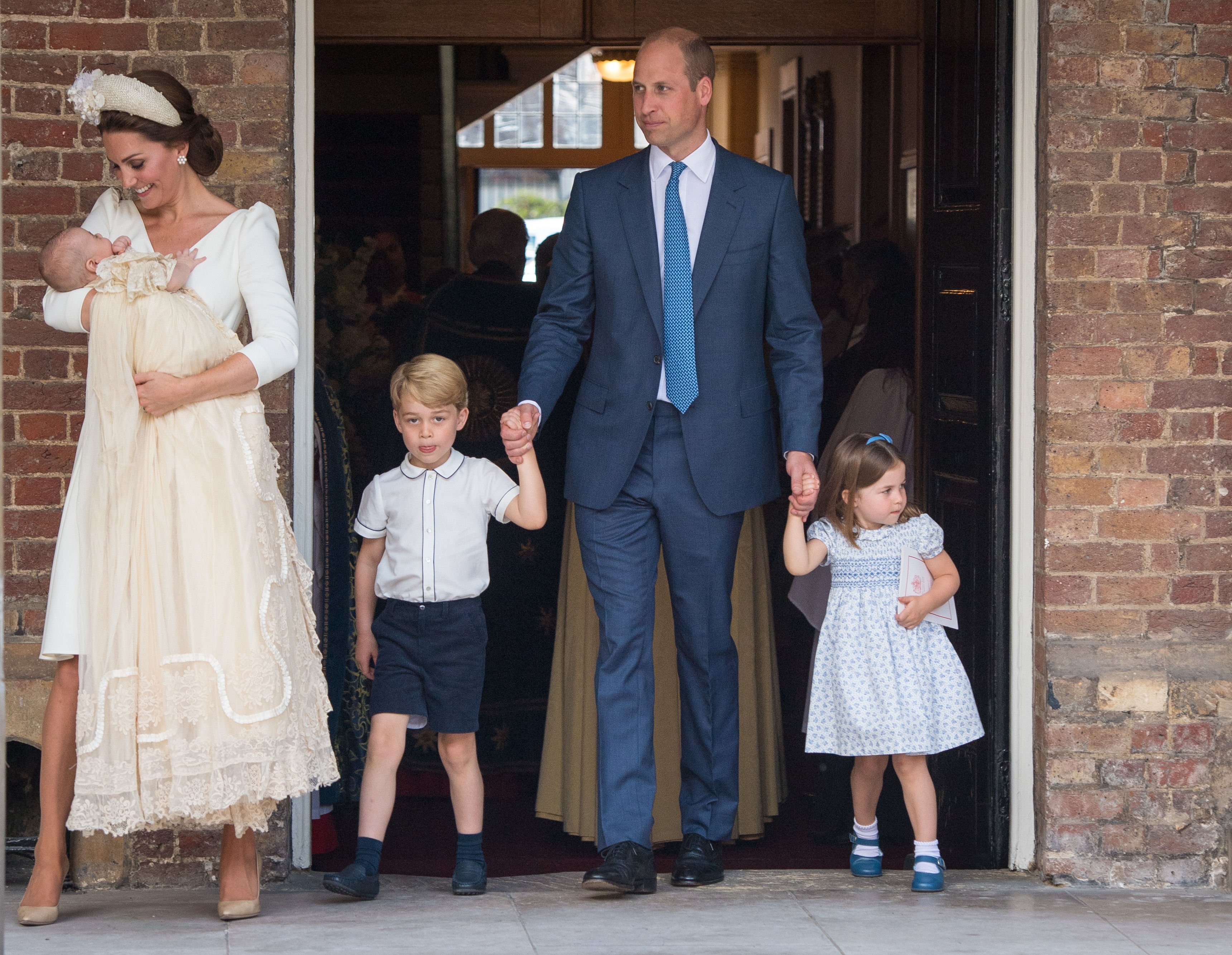 Duchess Kate and Prince William with their children Prince George, Princess Charlotte, and Prince Louis after Louis' christening at St James's Palace on July 09, 2018 in London, England | Photo: Getty Images