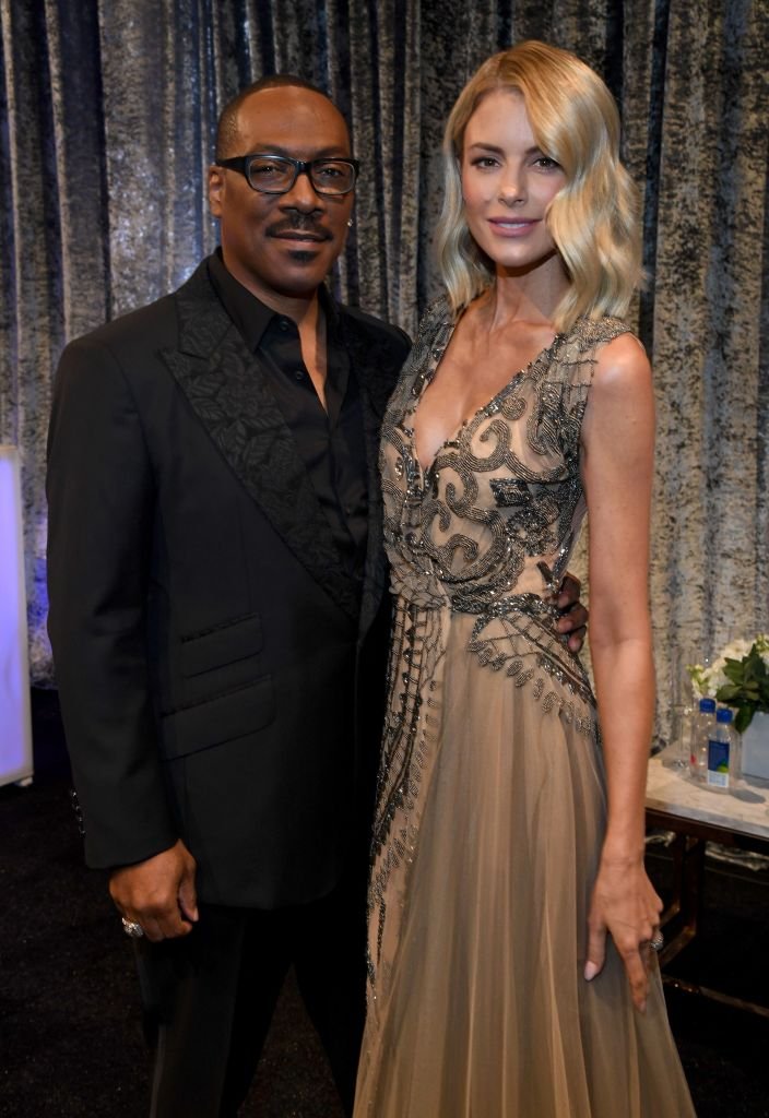 Eddie Murphy and Paige Butcher at the 25th Annual Critics' Choice Awards on January 12, 2020 in Santa Monica | Photo: Getty Images
