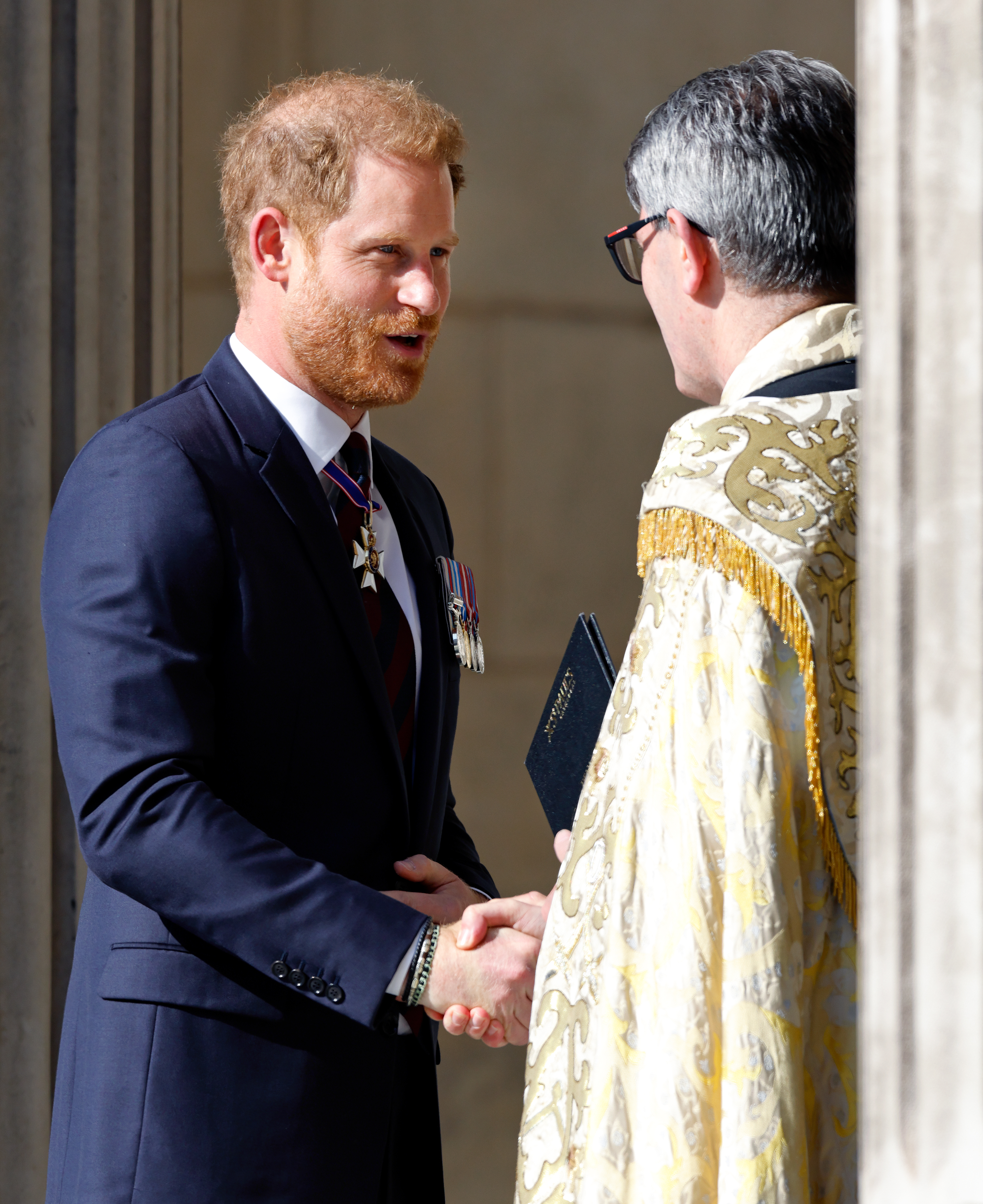 Prince Harry greets The Very Reverend Andrew Tremlett, Dean of St Paul's at St Paul's Cathedral on May 8, 2024 in London, England. | Source: Getty Images