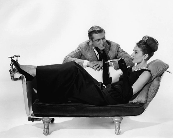  Audrey Hepburn and George Peppard pose for a publicity still for the Paramount Pictures film 'Breakfast at Tiffany's' in 1961 in New York City | Photo:Getty Images