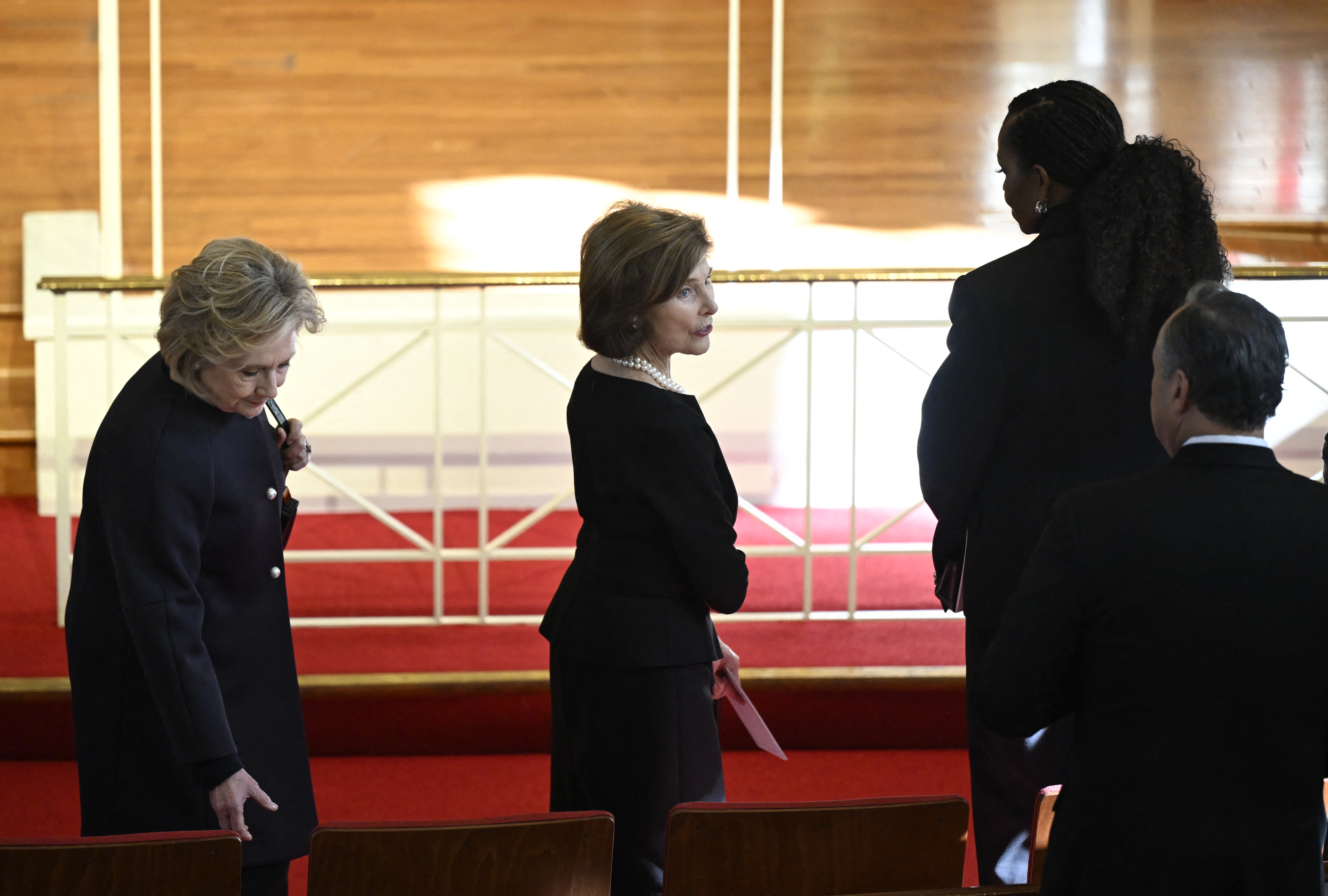 Former U.S. First Ladies Hillary Clinton, Laura Bush, and Michelle Obama at former U.S First Lady Rosalynn Carter's tribute service in Atlanta, Georgia on November 28, 2023 | Source: Getty Images