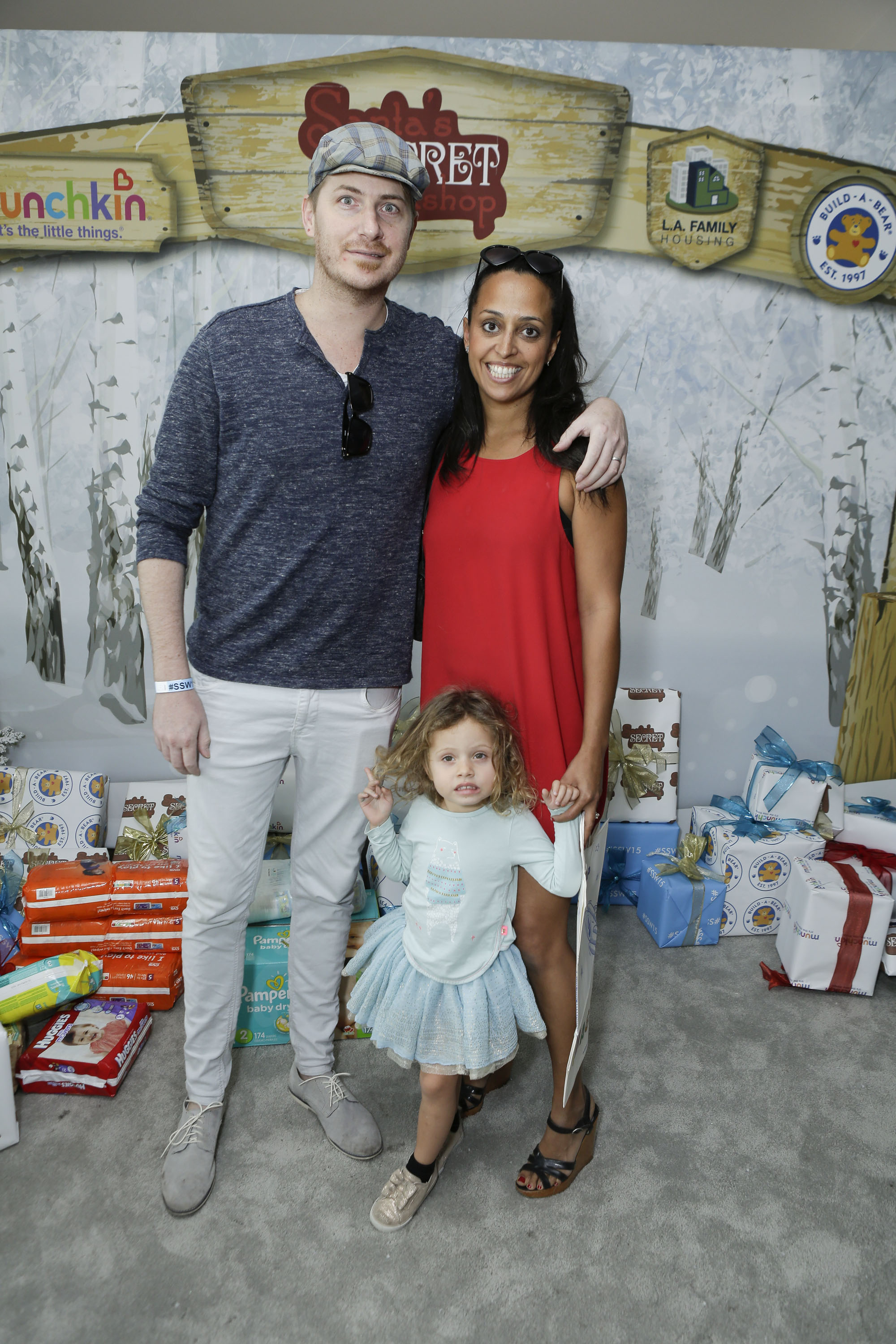 Joshua Faulkner, Chudney Ross, and Callaway Faulkner at Santa's Secret Workshop Benefiting L.A. Family Housing on December 5, 2015, in Los Angeles, California | Source: Getty Images