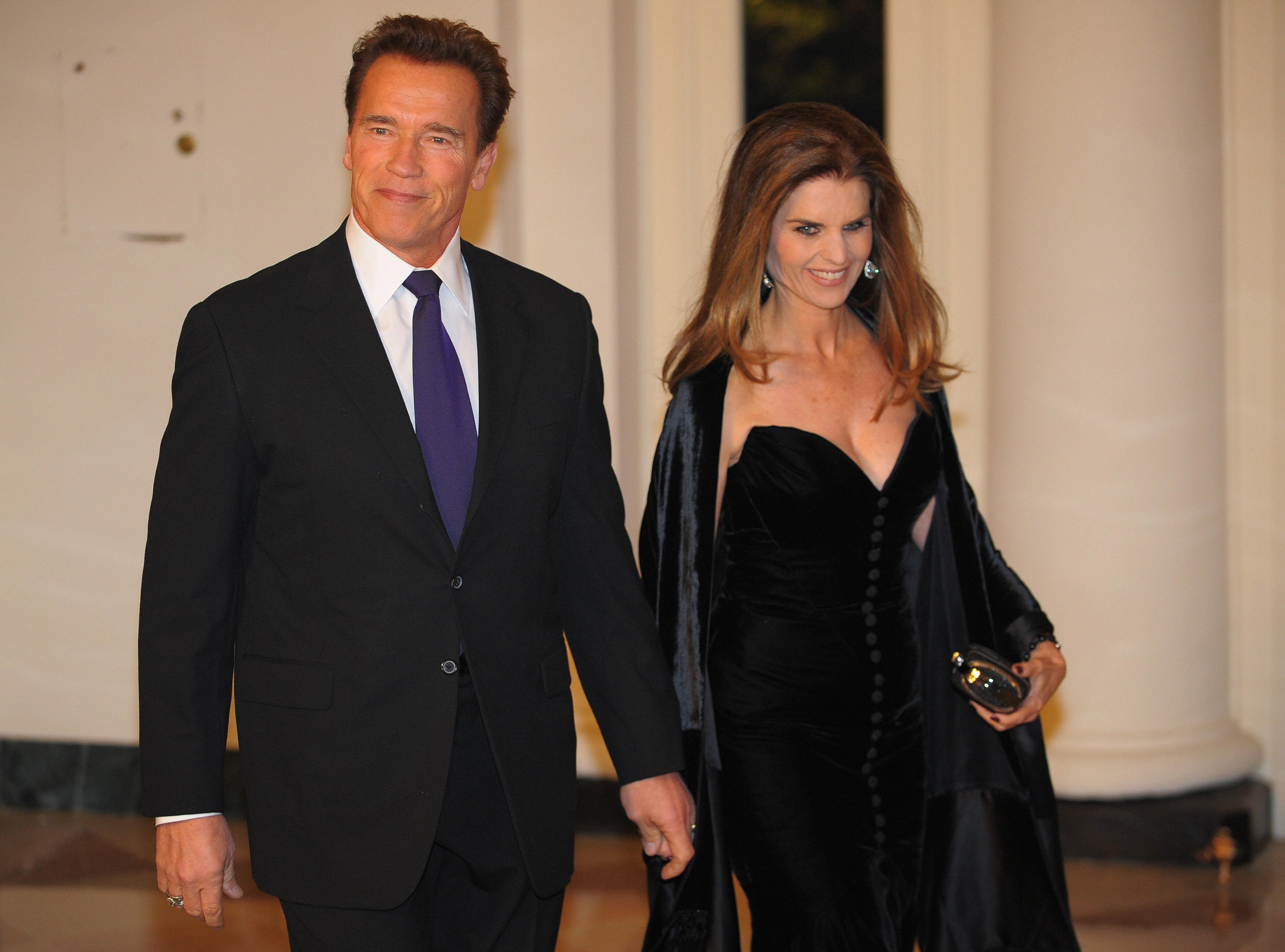 Arnold Schwarzenegger and his wife Maria Shriver arrive at the Book Seller's Entrance February 22, 2009 at the White House for the 2009 Governors Dinner in Washington, DC | Source: Getty Images 