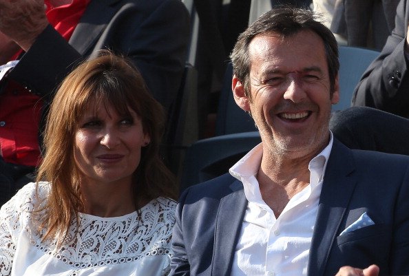 Jean-Luc Reichmann et son épouse Nathalie Reichmann encouragent Gael Monfils le 7ème jour de l'Open de France 2014 qui s'est tenue au stade Roland-Garros le 31 mai 2014 à Paris, France.