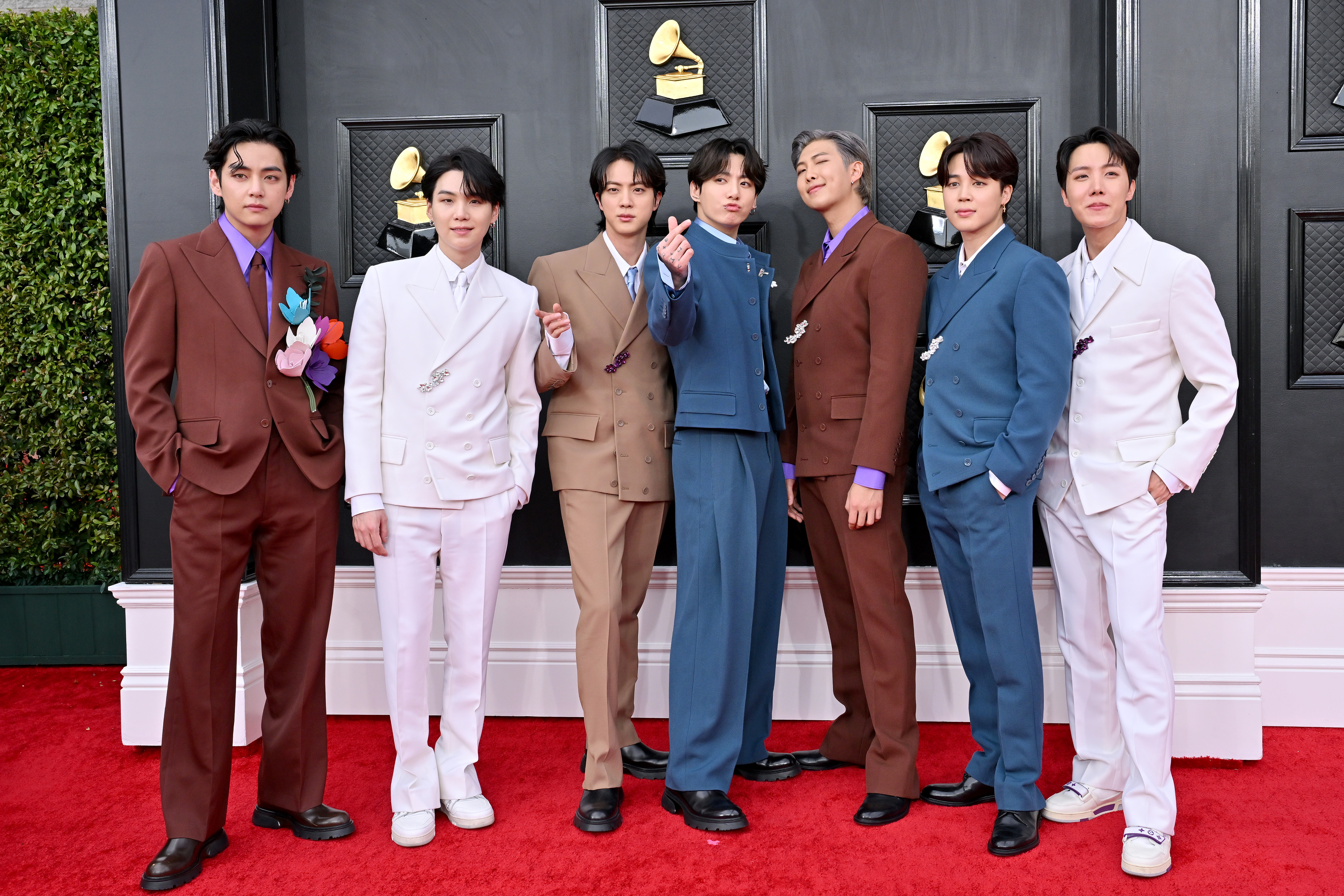 V, Suga, Jin, Jungkook, RM, Jimin and J-Hope of BTS attends the 64th Annual GRAMMY Awards at MGM Grand Garden Arena on April 03, 2022 in Las Vegas, Nevada. | Source: Getty Images