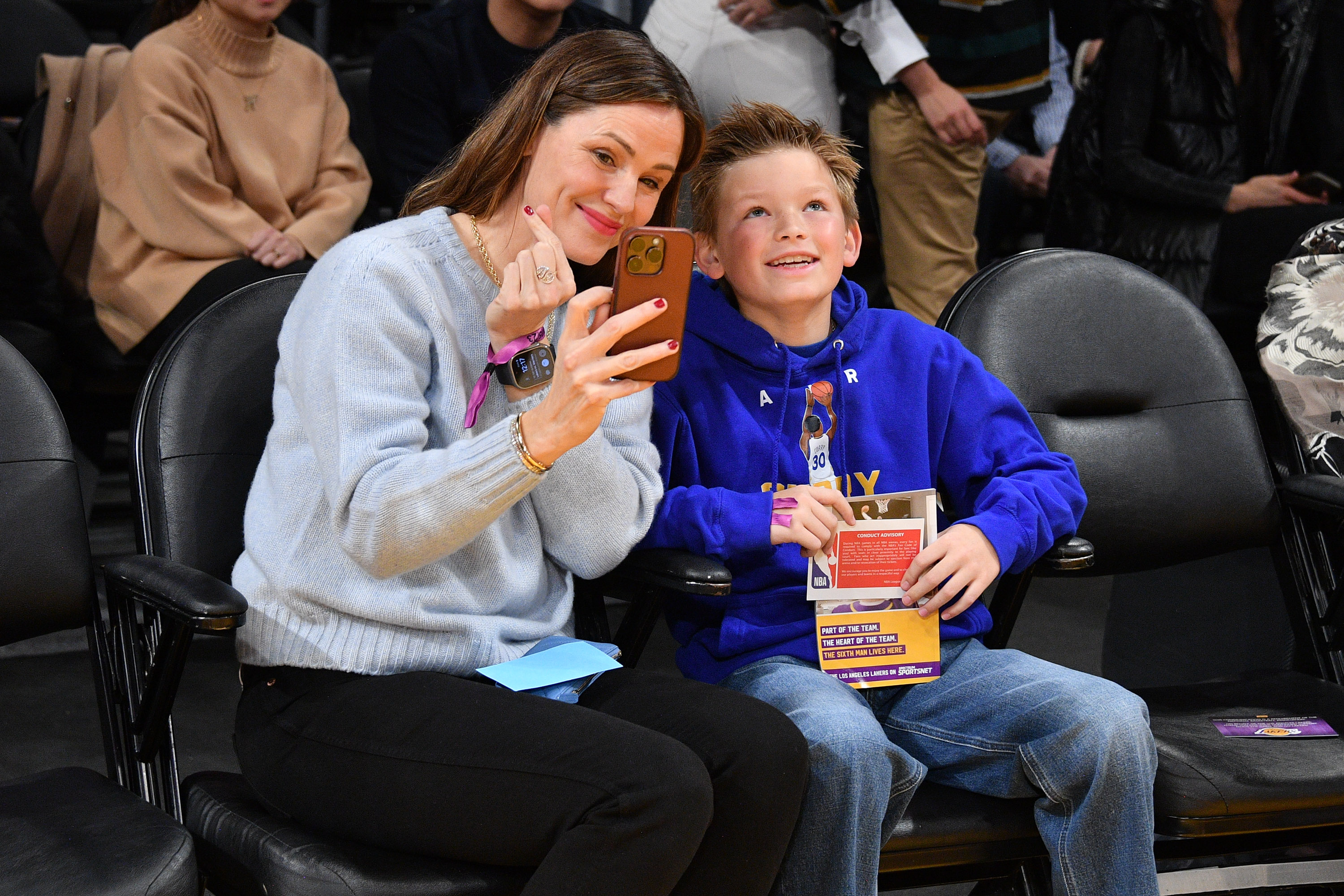 Jennifer Garner and Samuel Garner Affleck attend a basketball game between the Los Angeles Lakers and the Golden State Warriors at Crypto.com Arena on March 5, 2023, in Los Angeles, California. | Source: Getty Images