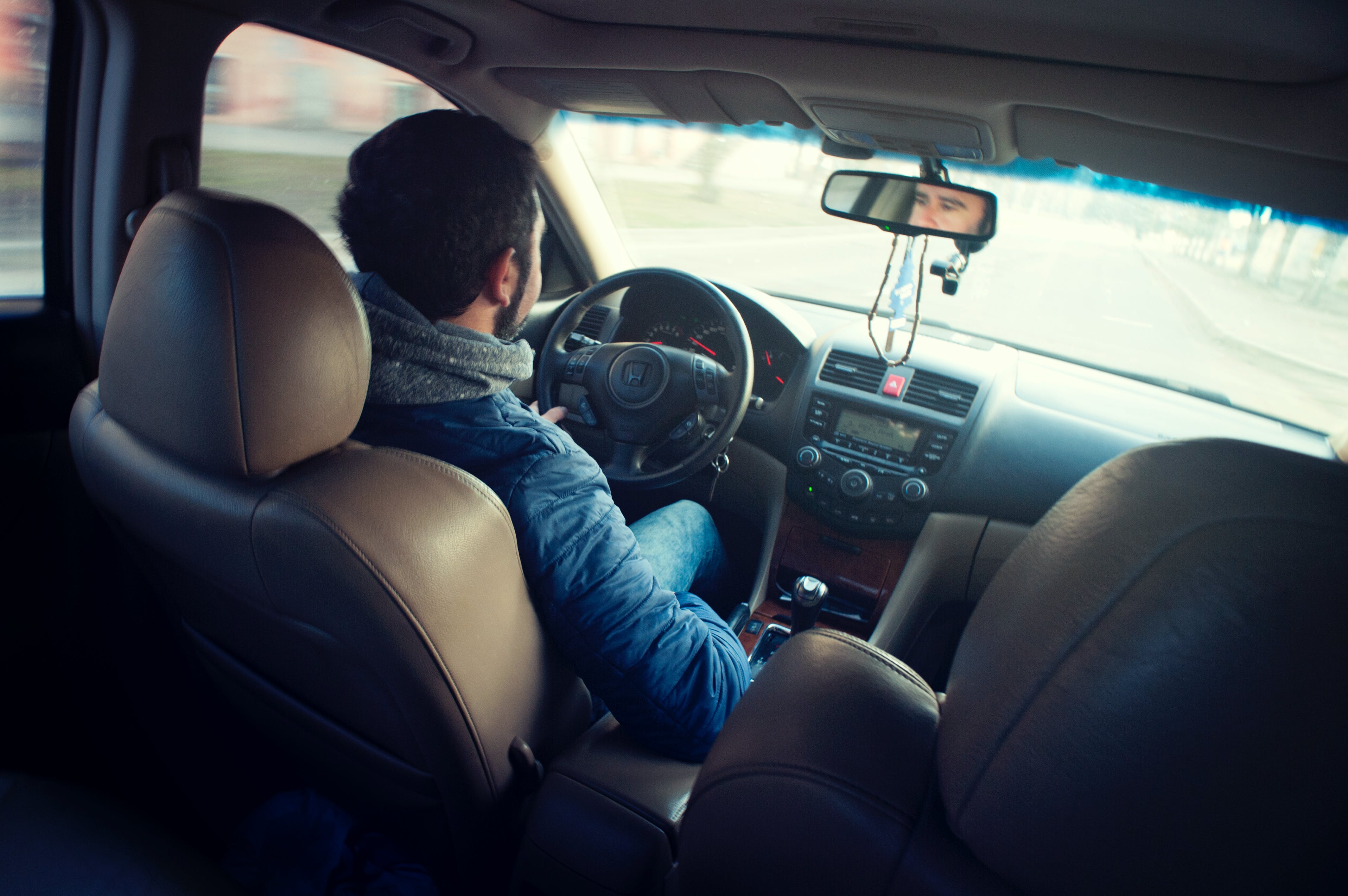 A driving by himself | Source: Pexels