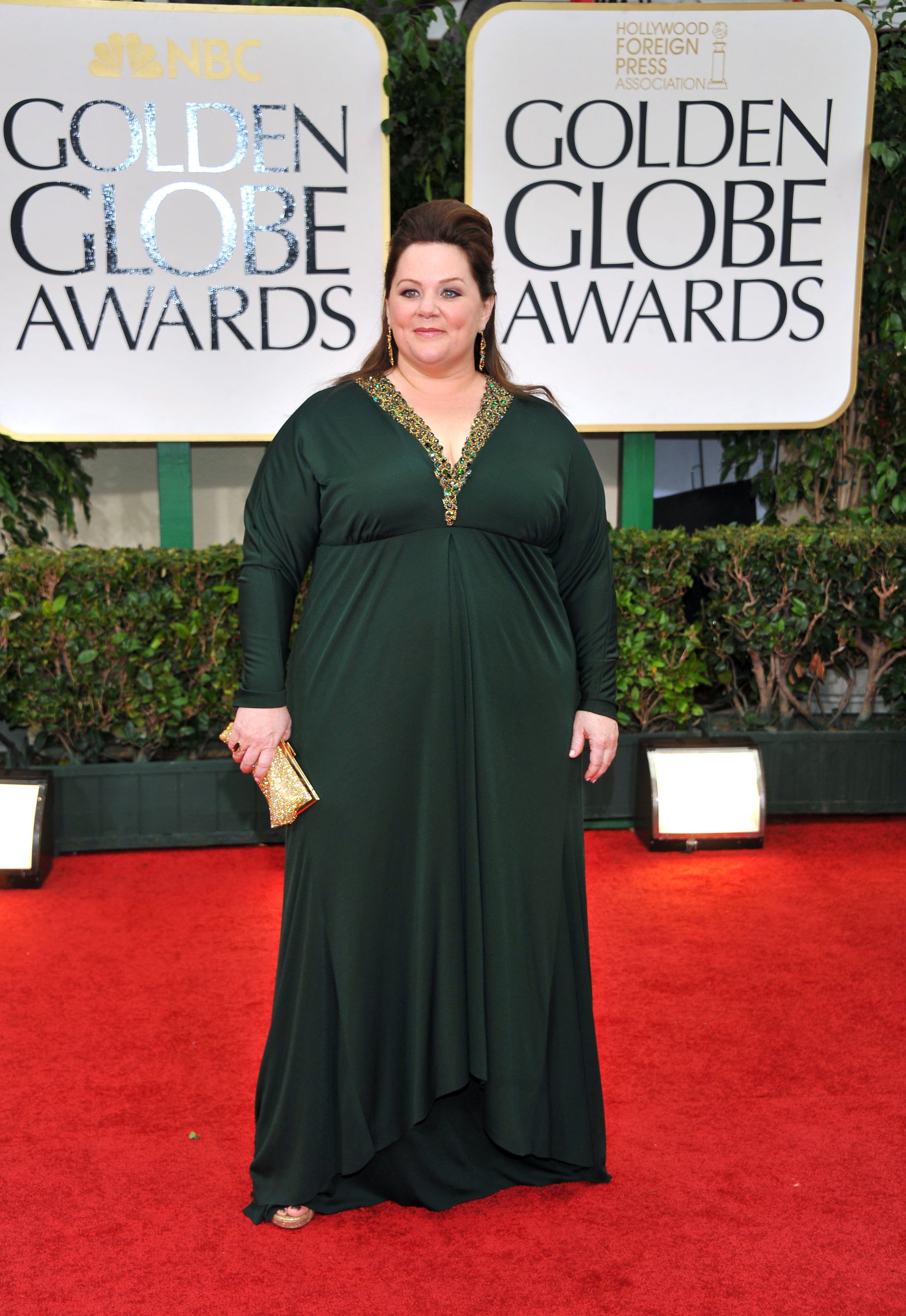 At the 2012 Golden Globes, McCarthy leaned into classic elegance, choosing a flowing silhouette with refined detailing that marked a more polished red carpet phase.
