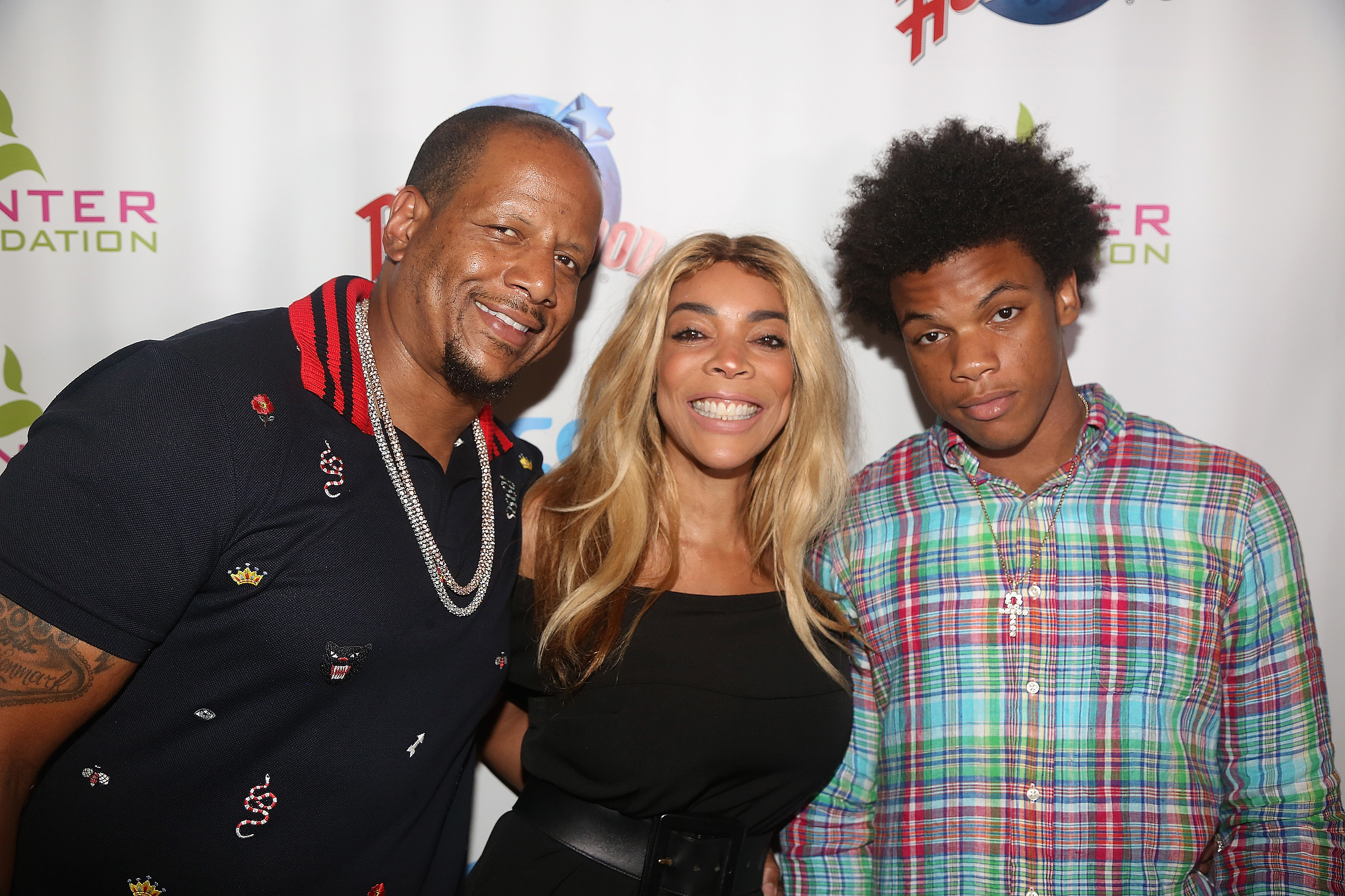 Kevin Hunter Sr., his wife Wendy Williams, and their son Kevin Hunter Jr. at a celebration for The Hunter Foundation Charity on July 11, 2017, in New York City | Source: Getty Images