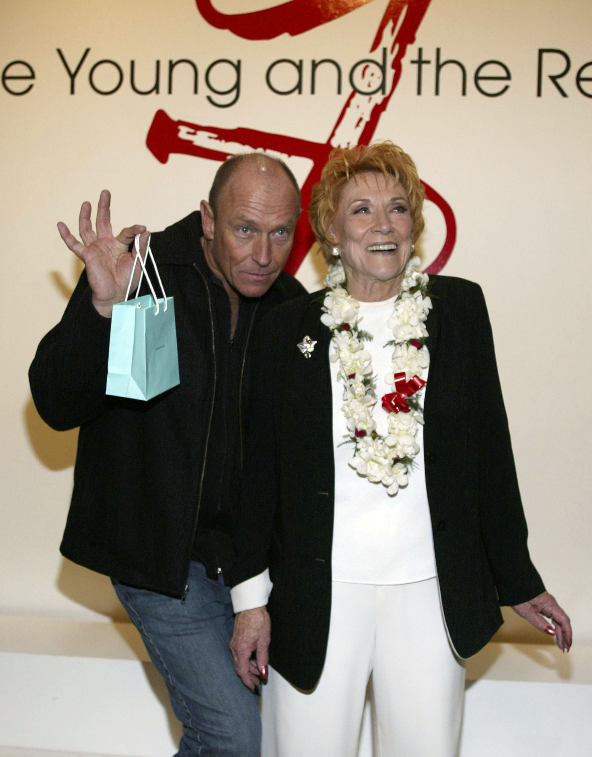 Corbin Bernsen and his mother, Jeanne Cooper, at the "The Young and the Restless" celebration for actress Jeanne Cooper's 30th year anniversary on the show at CBS Television City on January 28, 2004 in Los Angeles, California | Source: Getty Images