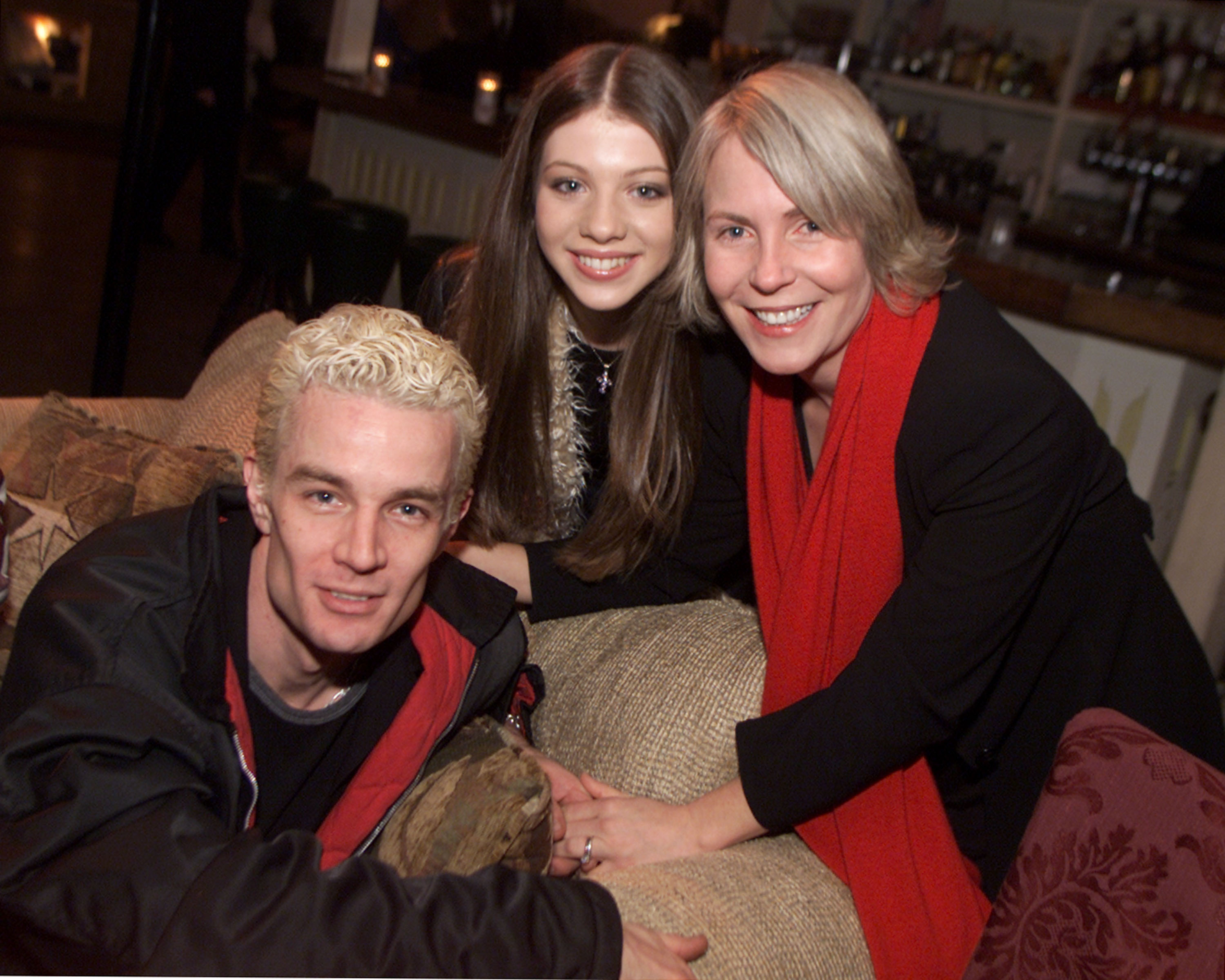 James Marsters, Michelle Trachtenberg, and executive producer Marti Noxon attend UPN's TCA party at Twin Palms in Los Angeles, California on January 14, 2002. | Source: Getty Images