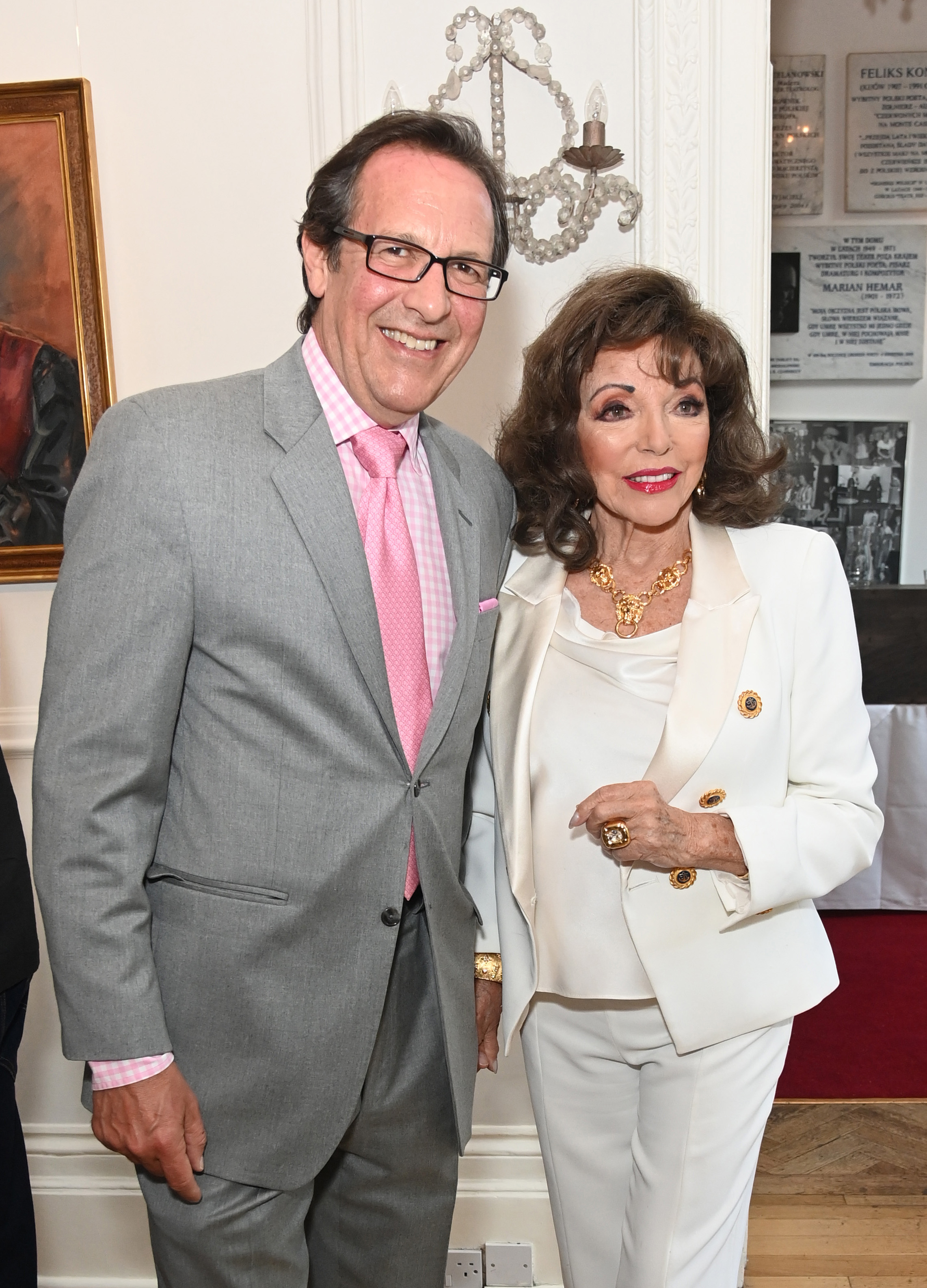 Percy Gibson and Joan Collins attend a book launch on June 8, 2023 in London, England | Source: Getty Images