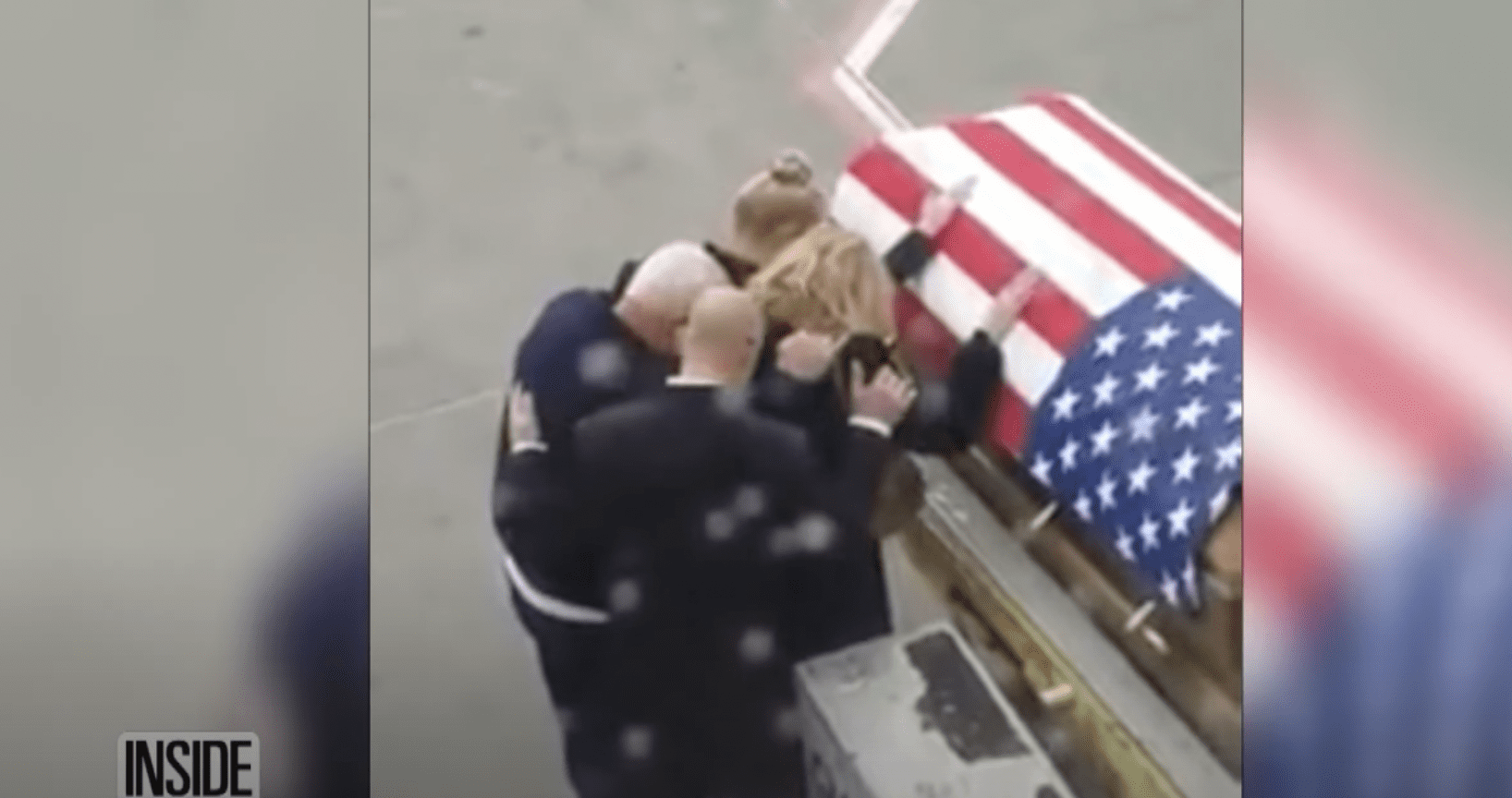 Tara is joined by her family as she breaks down standing near her late husband's coffin. | Source: YouTube.com/Inside Edition