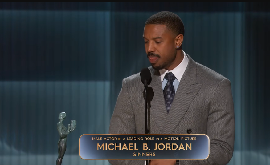 Michael B. Jordan accepts the award for Outstanding Performance by a Male Actor in a Leading Role during the 32nd Annual Actor Awards at Shrine Auditorium and Expo Hall on March 1, 2026, in Los Angeles, California | Source: YouTube/Netflix