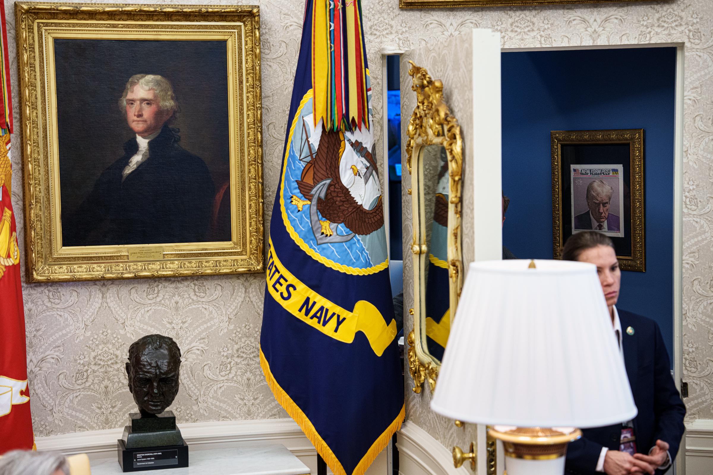 A copy of President Donald Trump's framed mugshot on the front of the New York Post is framed in an office just outside the Oval Office at the White House on February 14, 2025, in Washington, DC. | Source: Getty Images