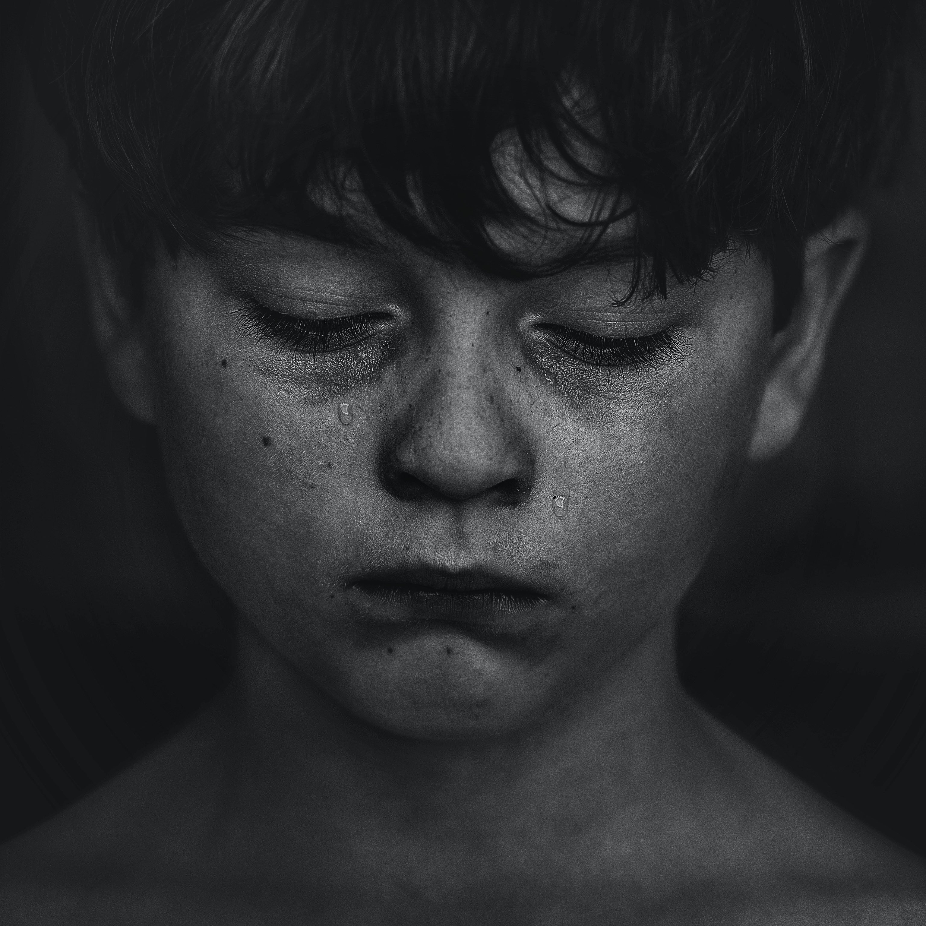 A boy crying | Source: Unsplash / Kat J
