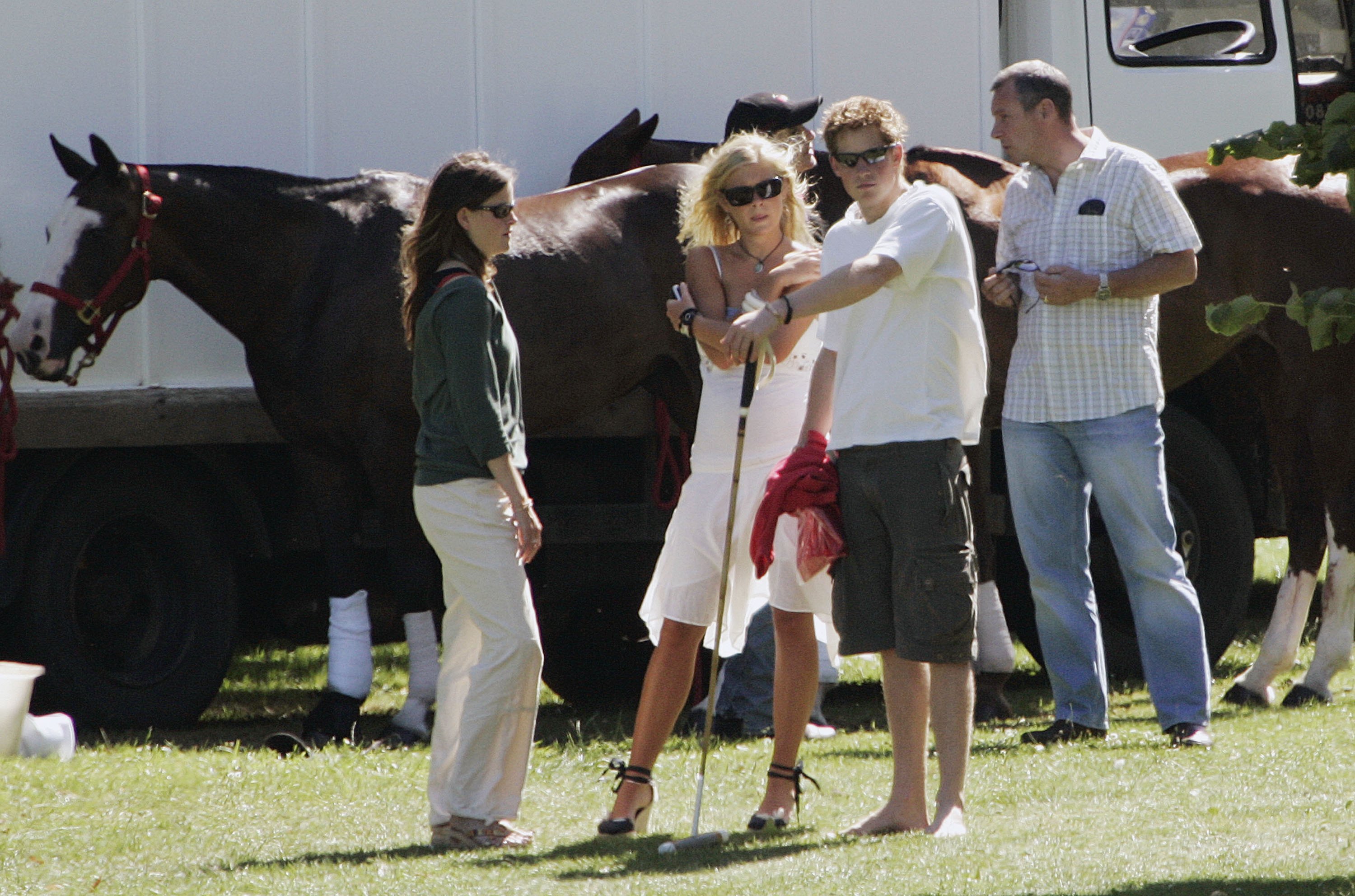 Prince Harry and his girlfriend Chelsy Davy attend Tidworth Polo Club on July 15, 2006 in Tidworth, England. | Source: Getty Images