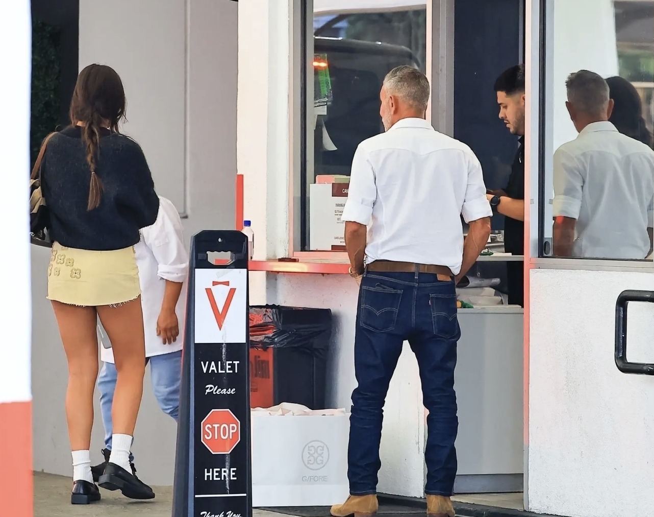 Hannah Harrison and Mossimo Giannulli are seen shopping at Giannulli's G/FORE Supply store in Beverly Hills on Thursday, October 2, 2025. | Source: Facebook/Mark Dohner