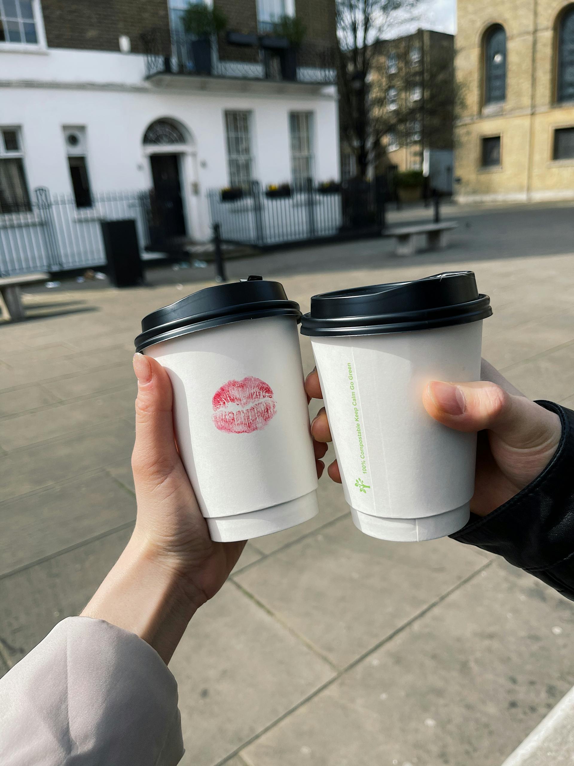 A couple holding takeaway coffee | Source: Pexels