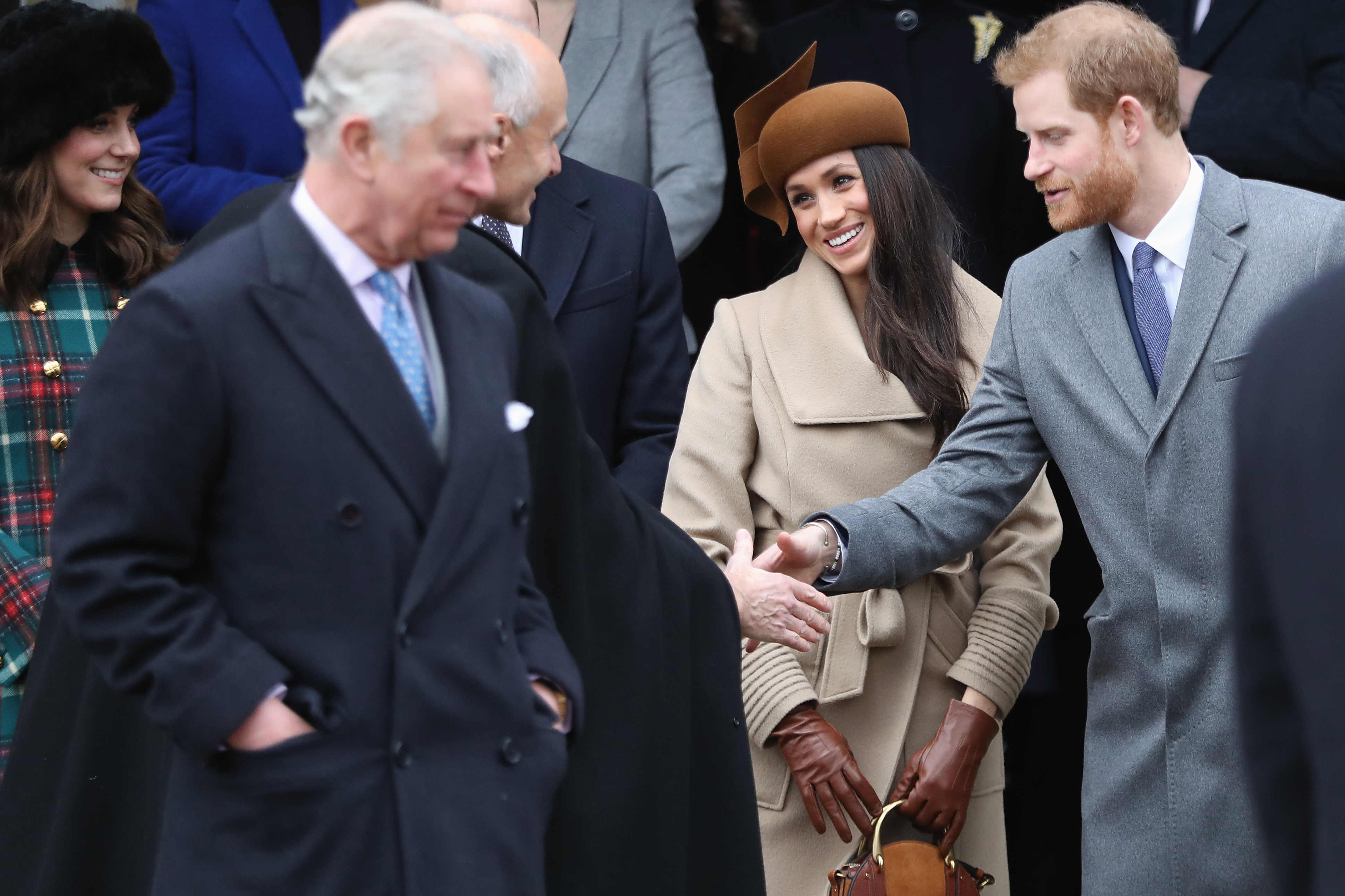 King Charles III, Meghan, Duchess of Sussex, and Prince Harry during the Royal Family's Christmas Day church service at the Church of St Mary Magdalene on December 25, 2017, in King's Lynn, England. | Source: Getty Images