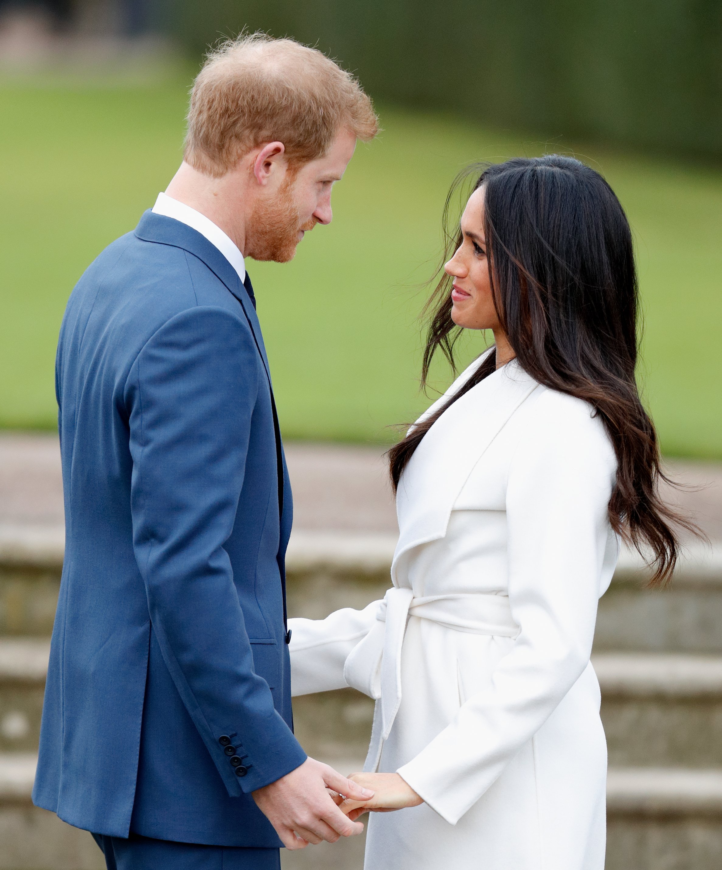 Prince Harry and Meghan Markle attend an official photocall to announce their engagement at The Sunken Gardens, Kensington Palace on November 27, 2017 in London, England | Source: Getty Images 