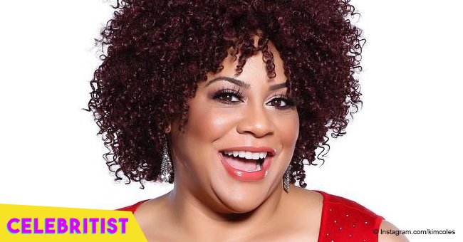  'Living Single' star Kim Coles, 56, stuns in purple maxi dress and afro hair in recent photo