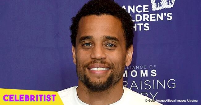 Michael Ealy touches hearts with photo of his little son in gray shirt and red hat