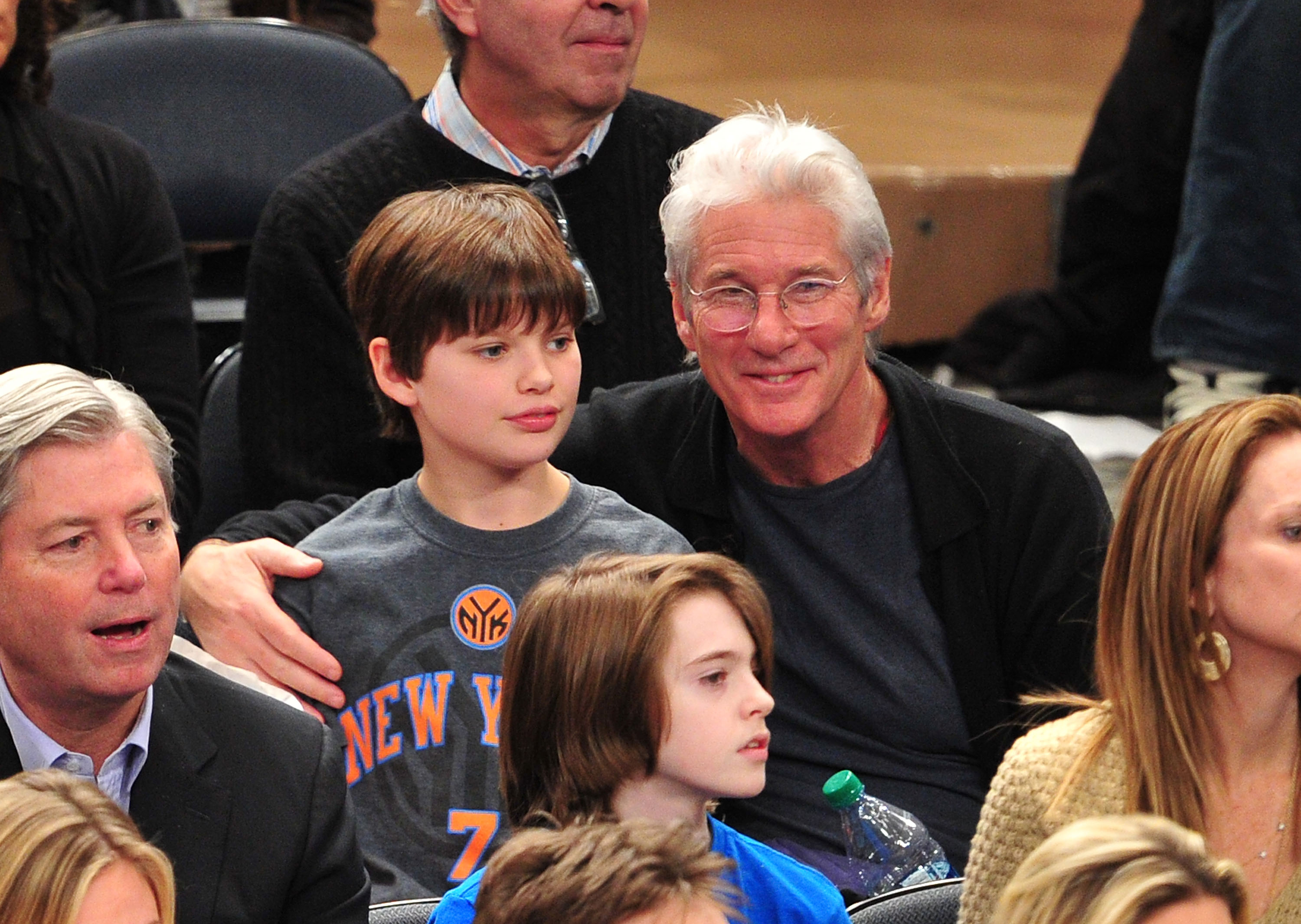 Homer James Jigme Gere and Richard Gere at a Chicago Bulls vs New York Knicks in New York City on February 2, 2012 | Source: Getty Images