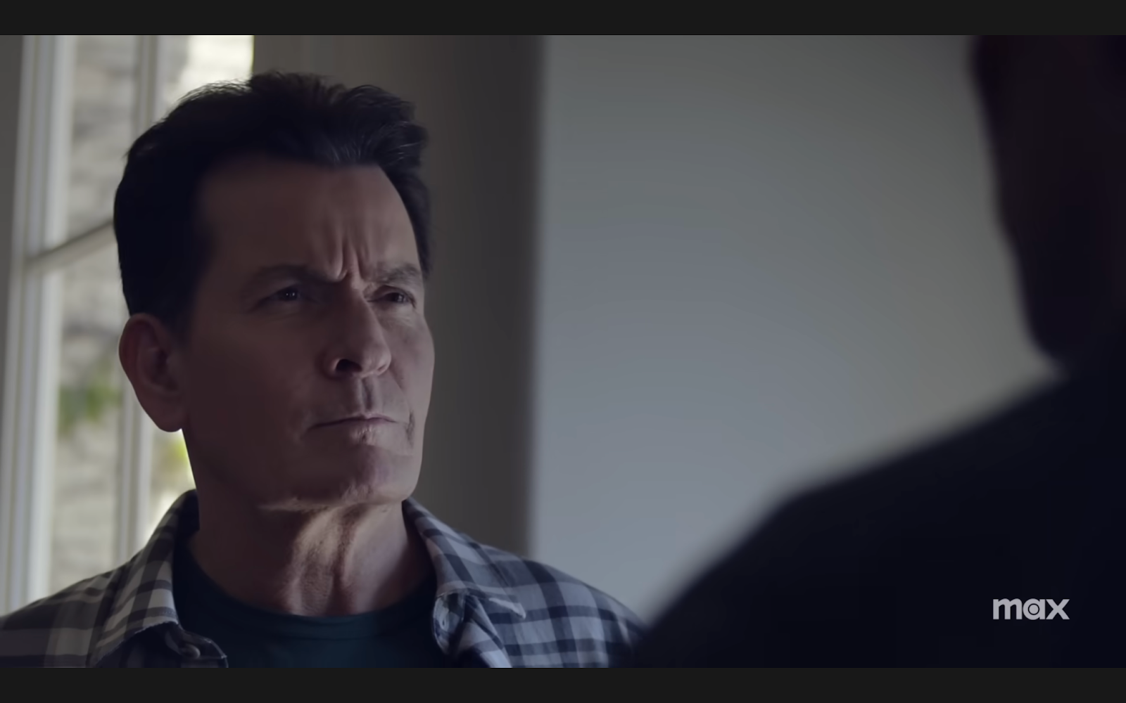 Charlie Sheen on the show "Bookie" | Source: Youtube.com/Max