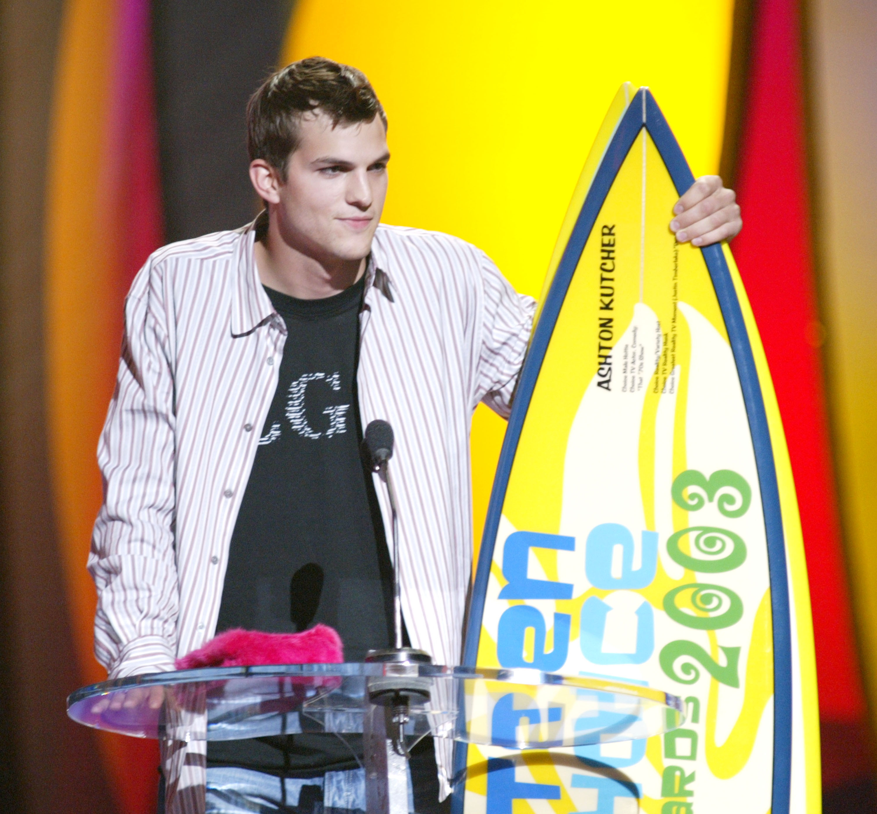 Ashton Kutcher, winner of the Choice TV Personality and Choice Reality/TV Star awards for "Punk'd," during the 2004 Teen Choice Awards on August 8. | Source: Getty Images