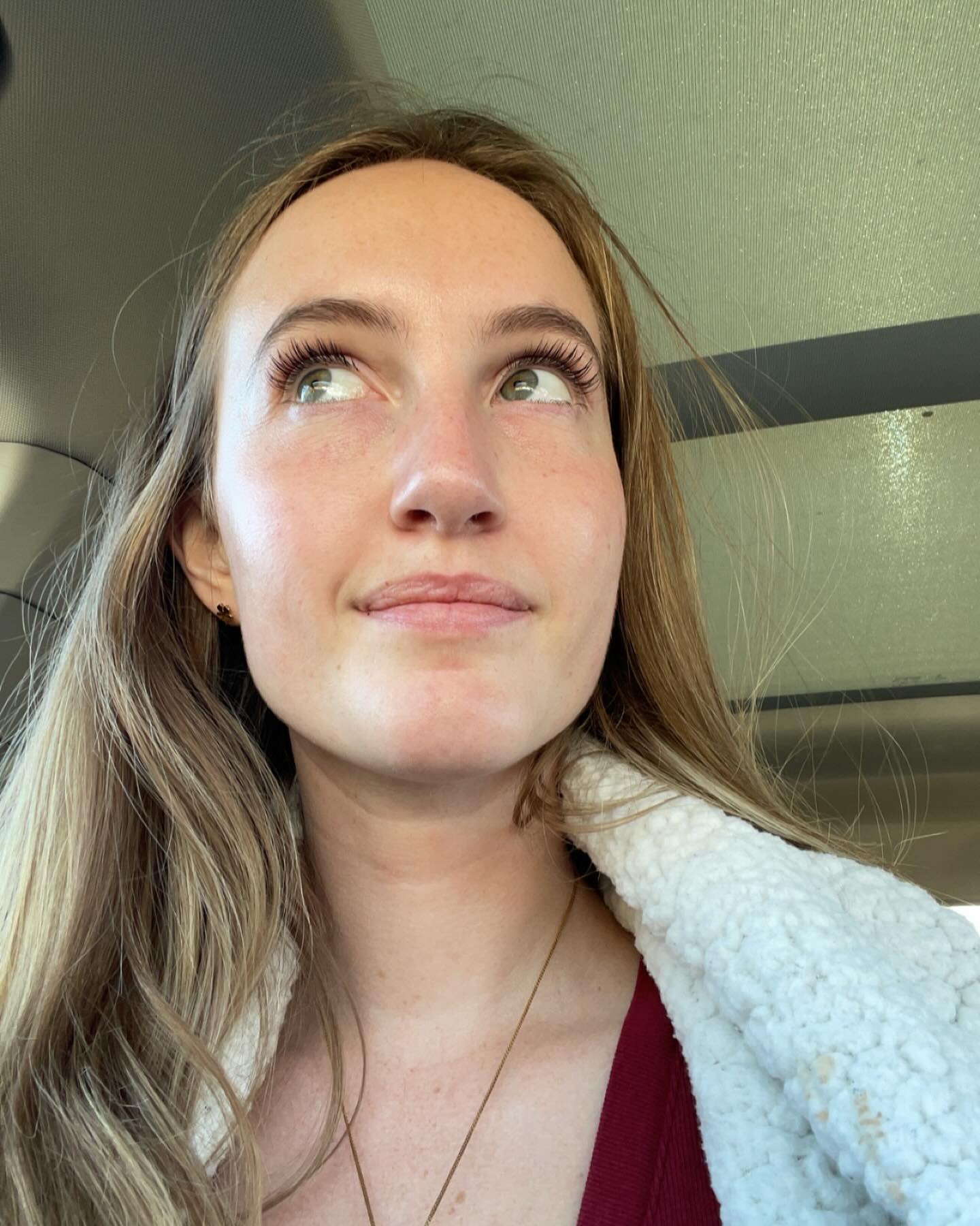 Emily Beutner sitting in a car, from a post dated January 28, 2024 | Source: Facebook/Emily Beutner