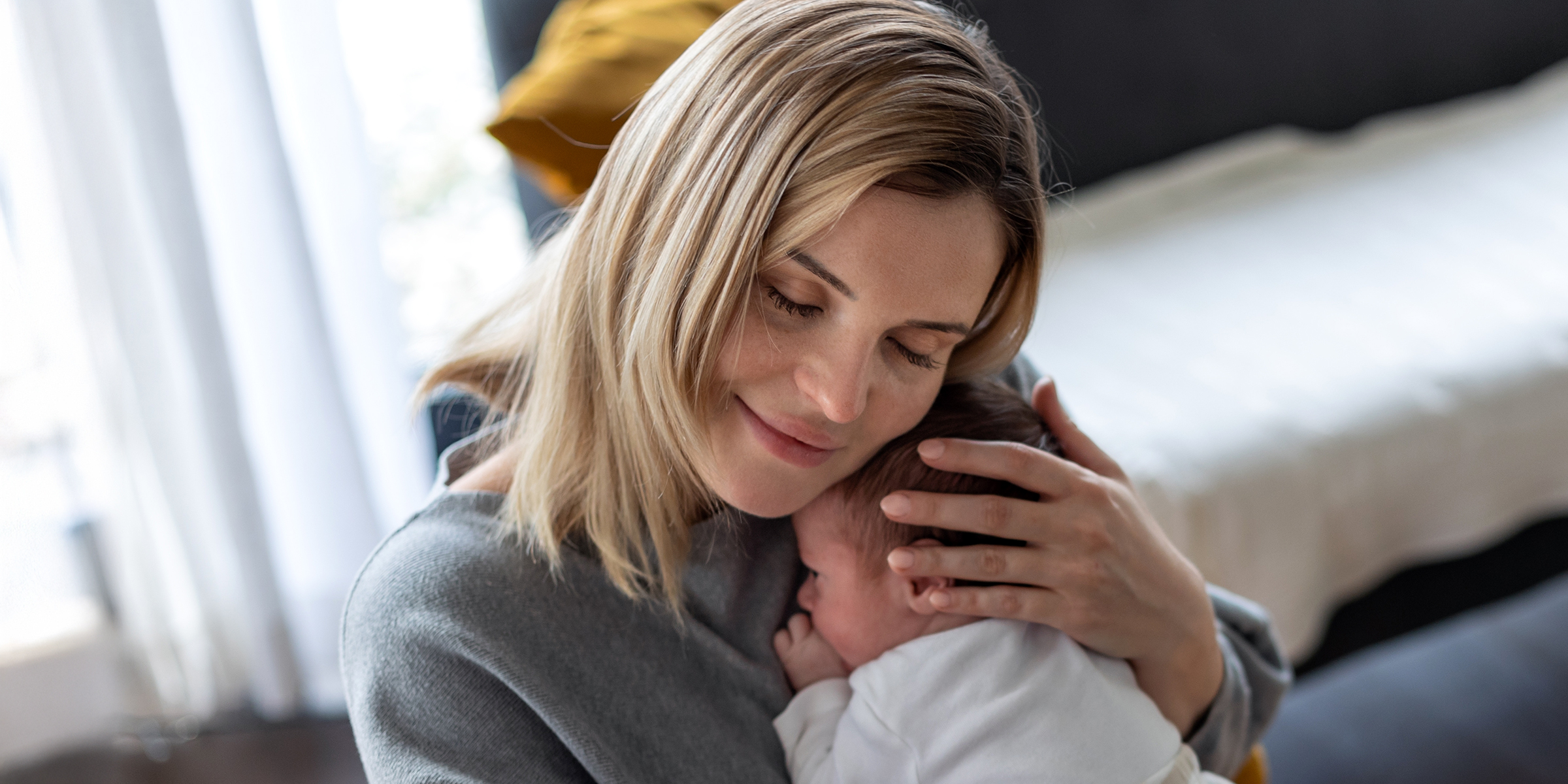 A woman with her baby | Source: Shutterstock