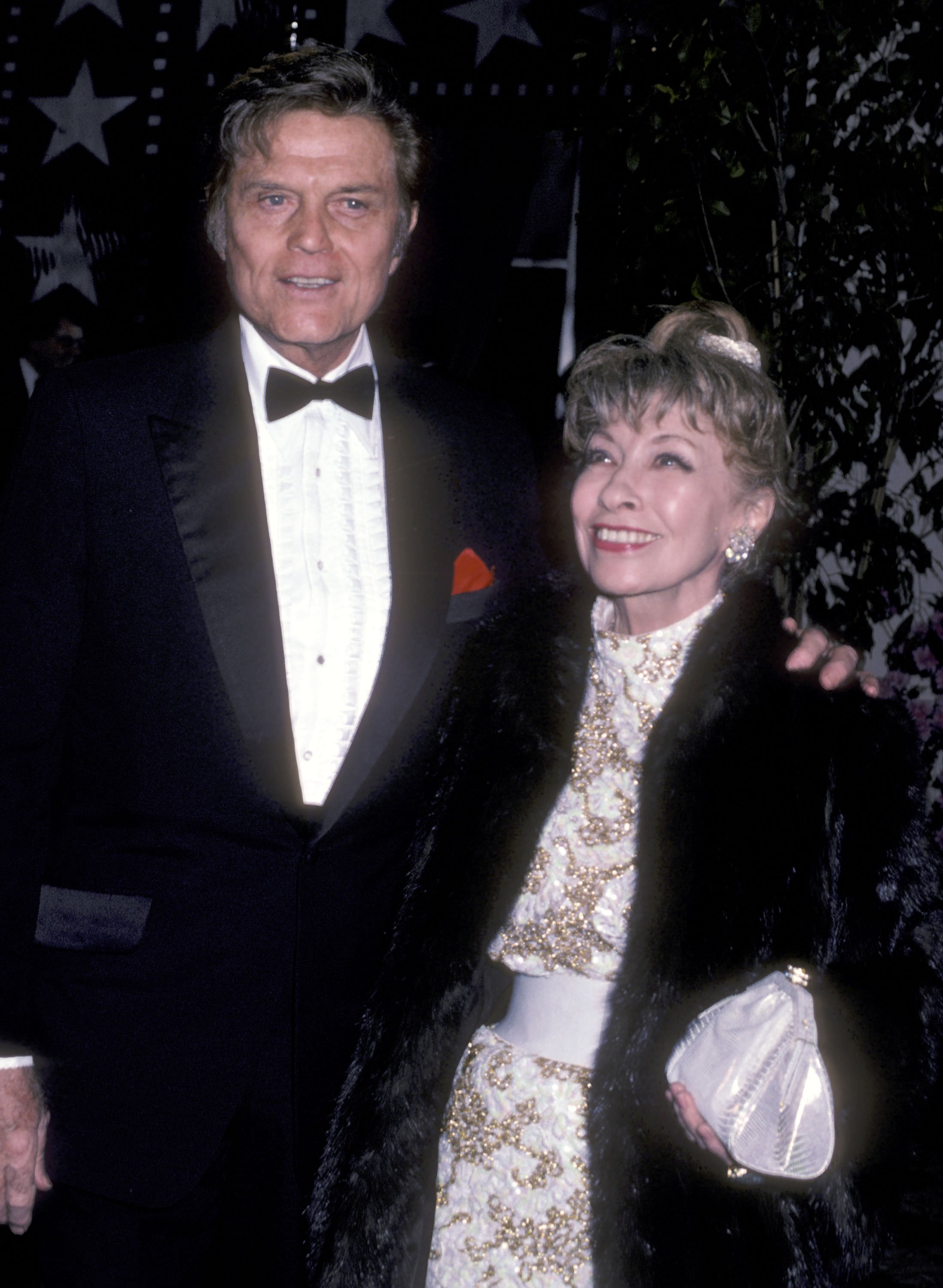 Actor Jack Lord and wife Marie Denarde attend the 13th Annual American Film Institute (AFI) Lifetime Achievement Award Salute to Gene Kelly on March 7, 1985 at Beverly Hilton Hotel in Beverly Hills, California. | Source: Getty Images