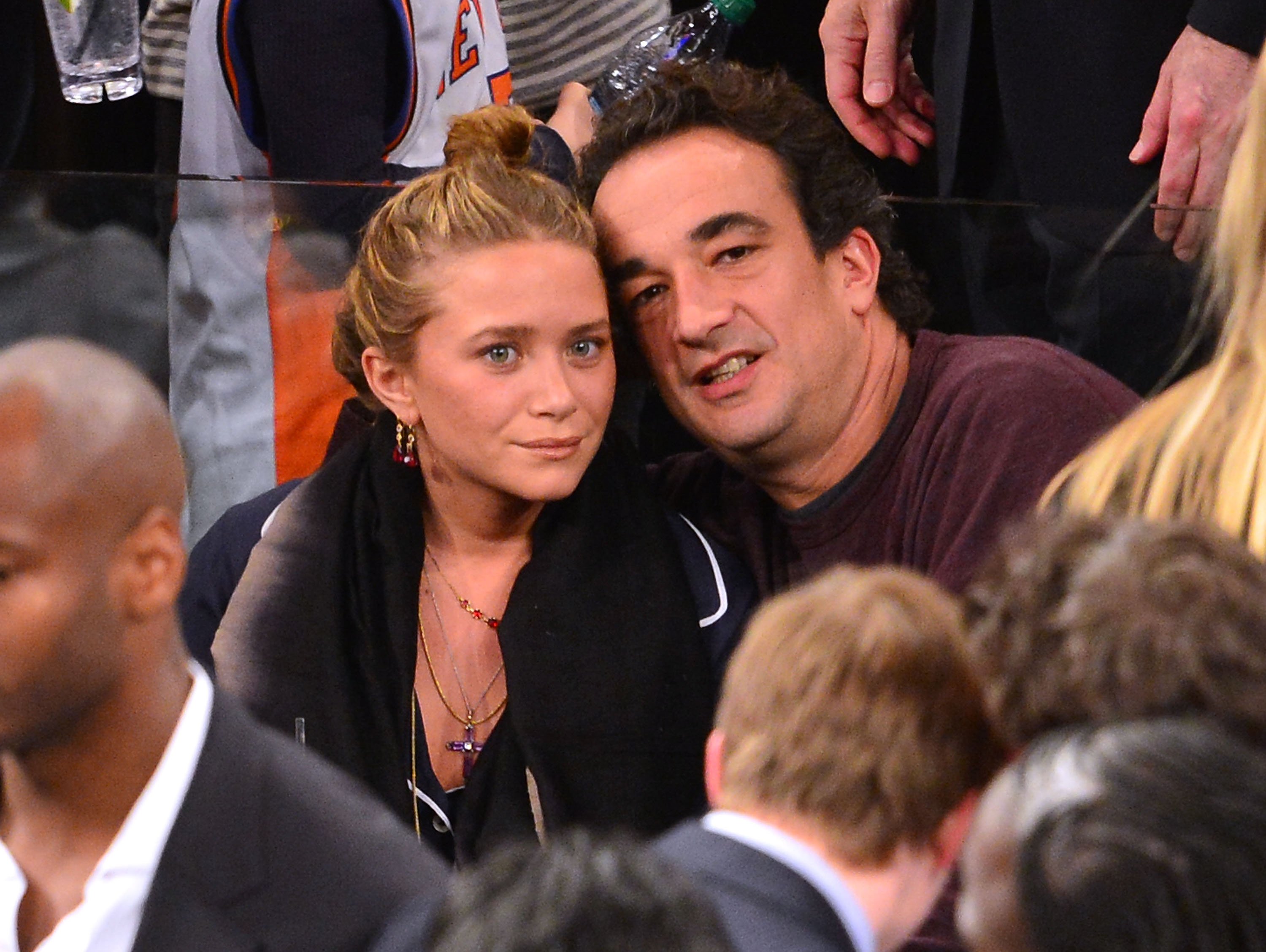 Mary-Kate Olsen and Olivier Sarkozy attending the Dallas Mavericks vs New York Knicks game at Madison Square Garden on November 9, 2012 in New York City. / Source: Getty Images