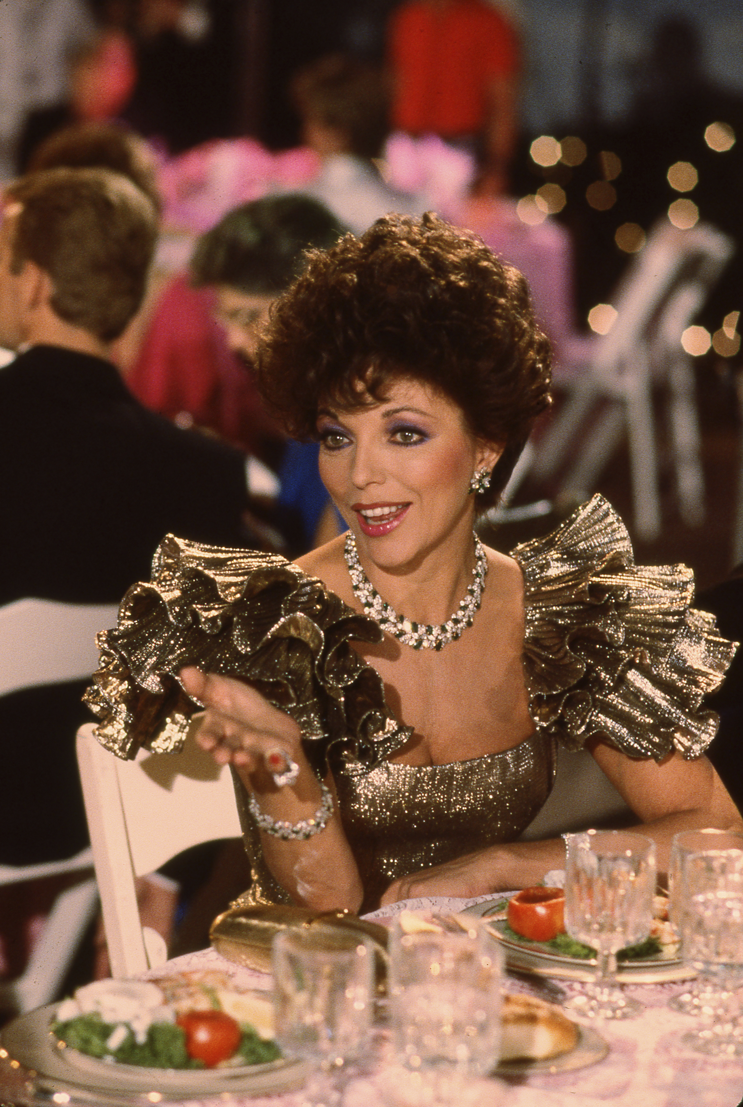 British born TV and movie actress Joan Collins on the set of the soap opera "Dynasty" in which she payed the scheming Alexis Carrington, in Hollywood in 1985. | Source: Getty Images