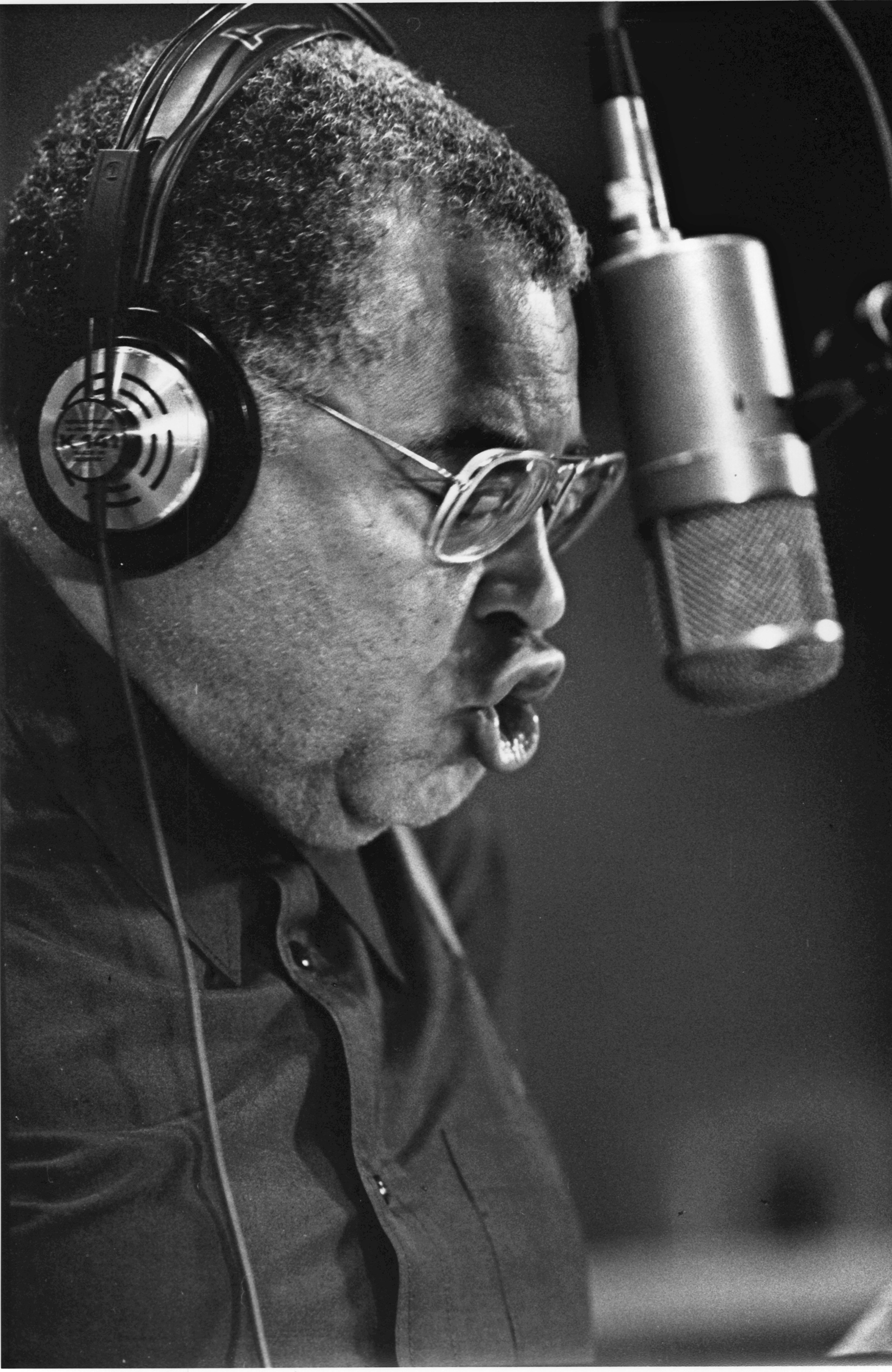 James Earl Jones speaking into a microphone in a recording studio in Hollywood, California, on July 10, 1991. | Source: Getty Images