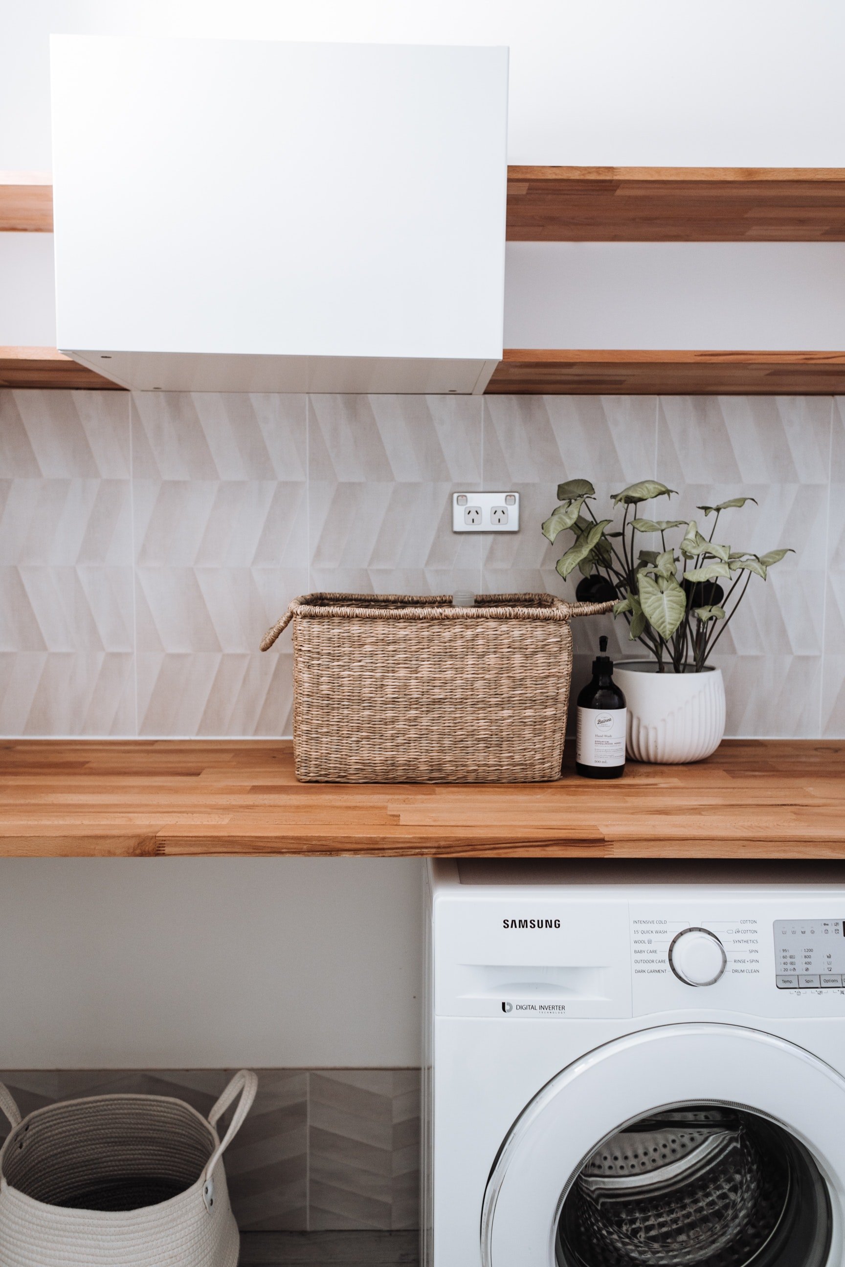 The washing machine has made laundry easy for Stella. | Source: Pexels