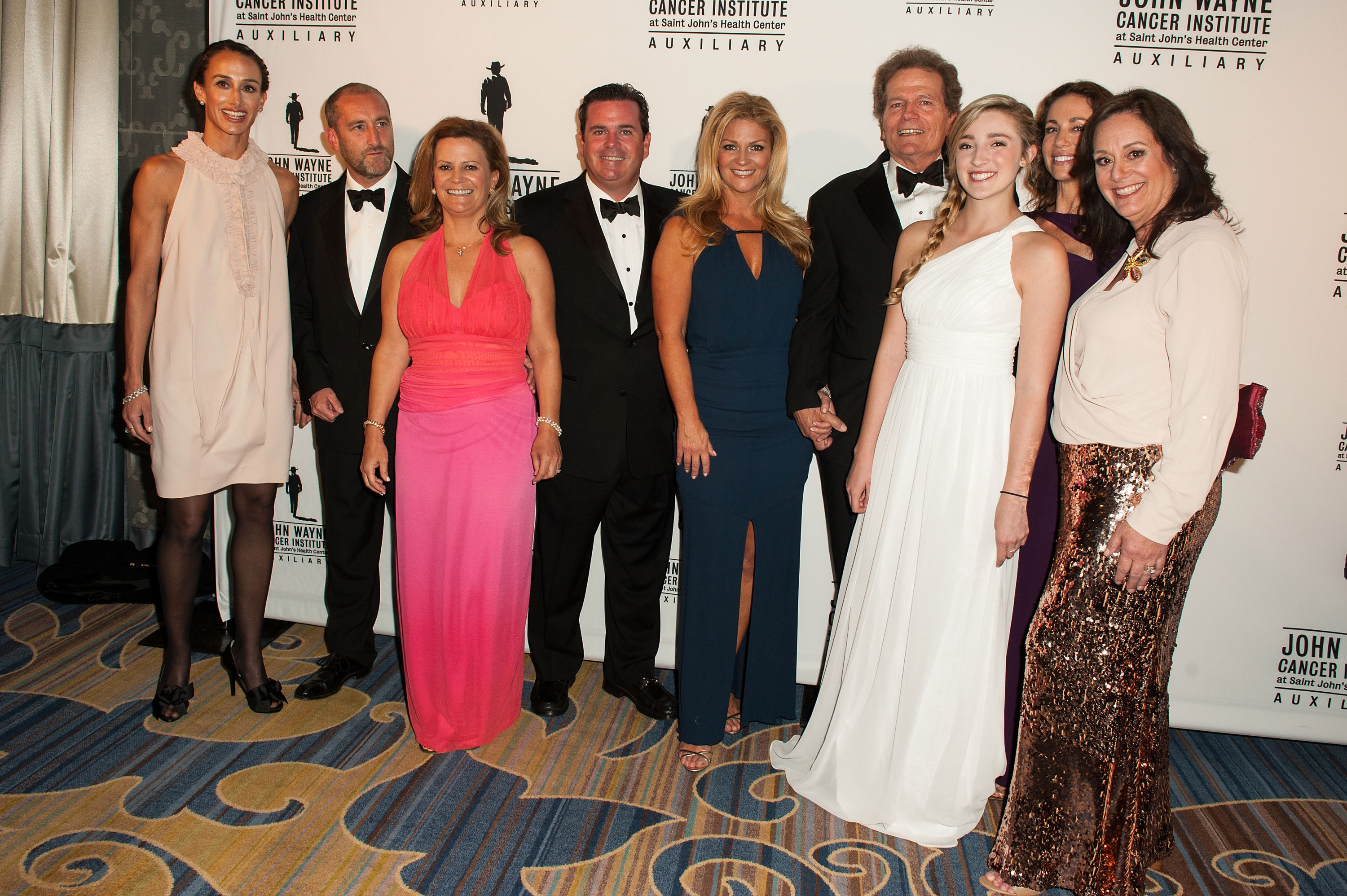 John Wayne's family during the John Wayne Cancer Institute Auxiliary's 29th Annual Odyssey Ball hosted at the Regent Beverly Wilshire Hotel on April 5, 2014 in Beverly Hills, California. | Source: Getty Images