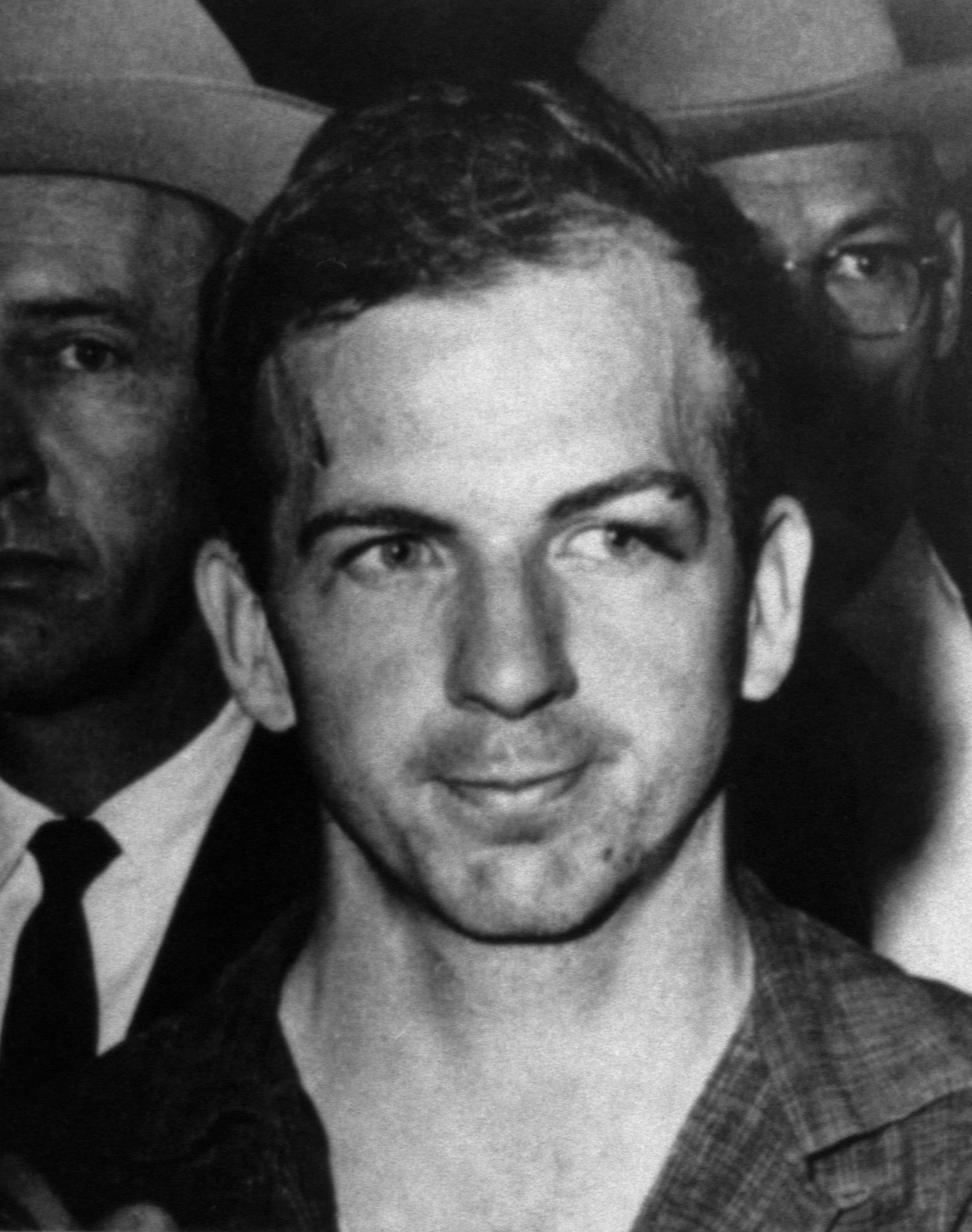 Lee Harvey Oswald arrested on November 22, 1963, on charges of assassinating President John F. Kennedy and murdering a Dallas police officer. | Source: Getty Images